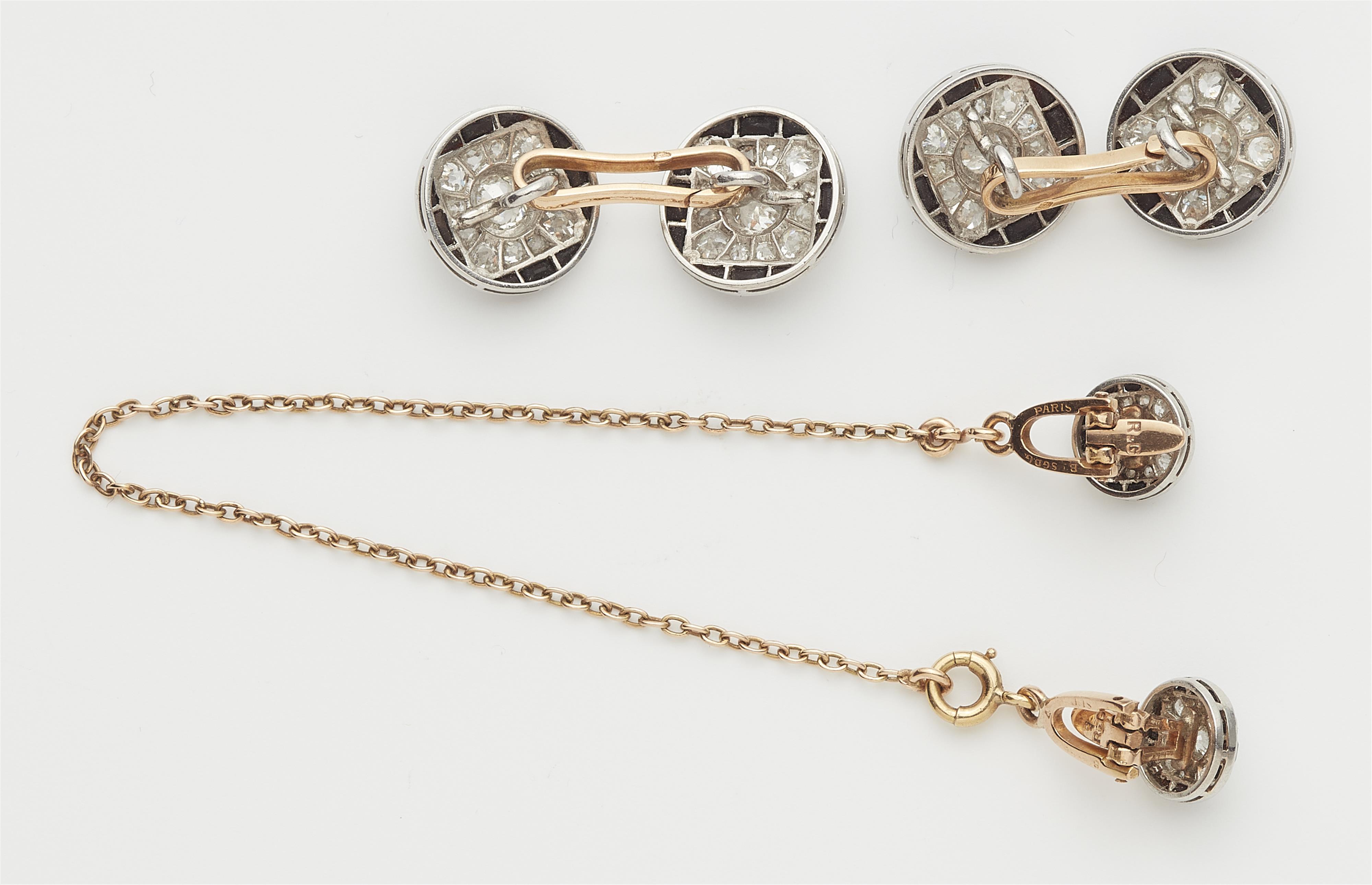 A French Art Déco platinum, 18k gold, diamond and onyx dress set. - image-2