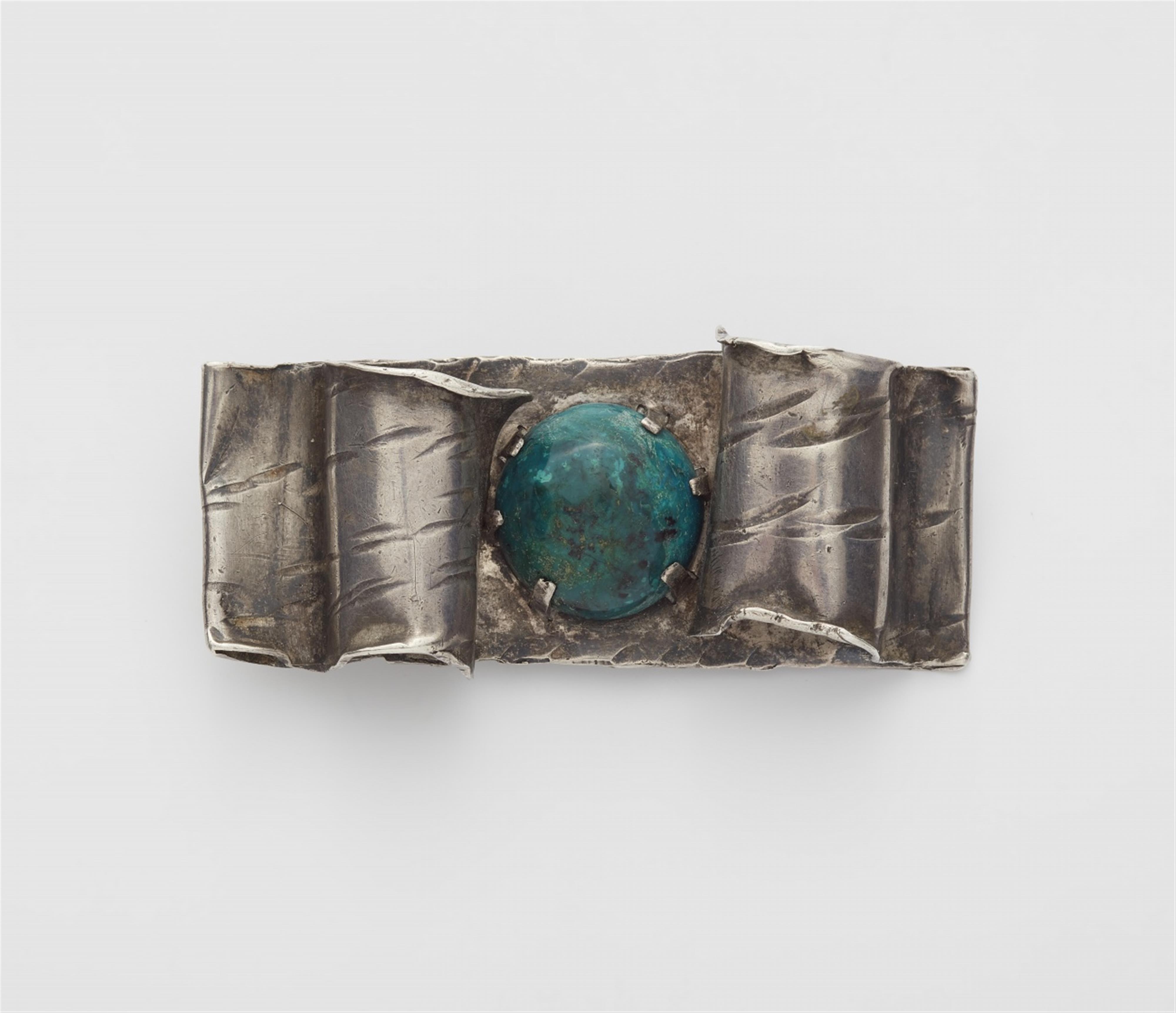 A silver azurite brooch - image-1