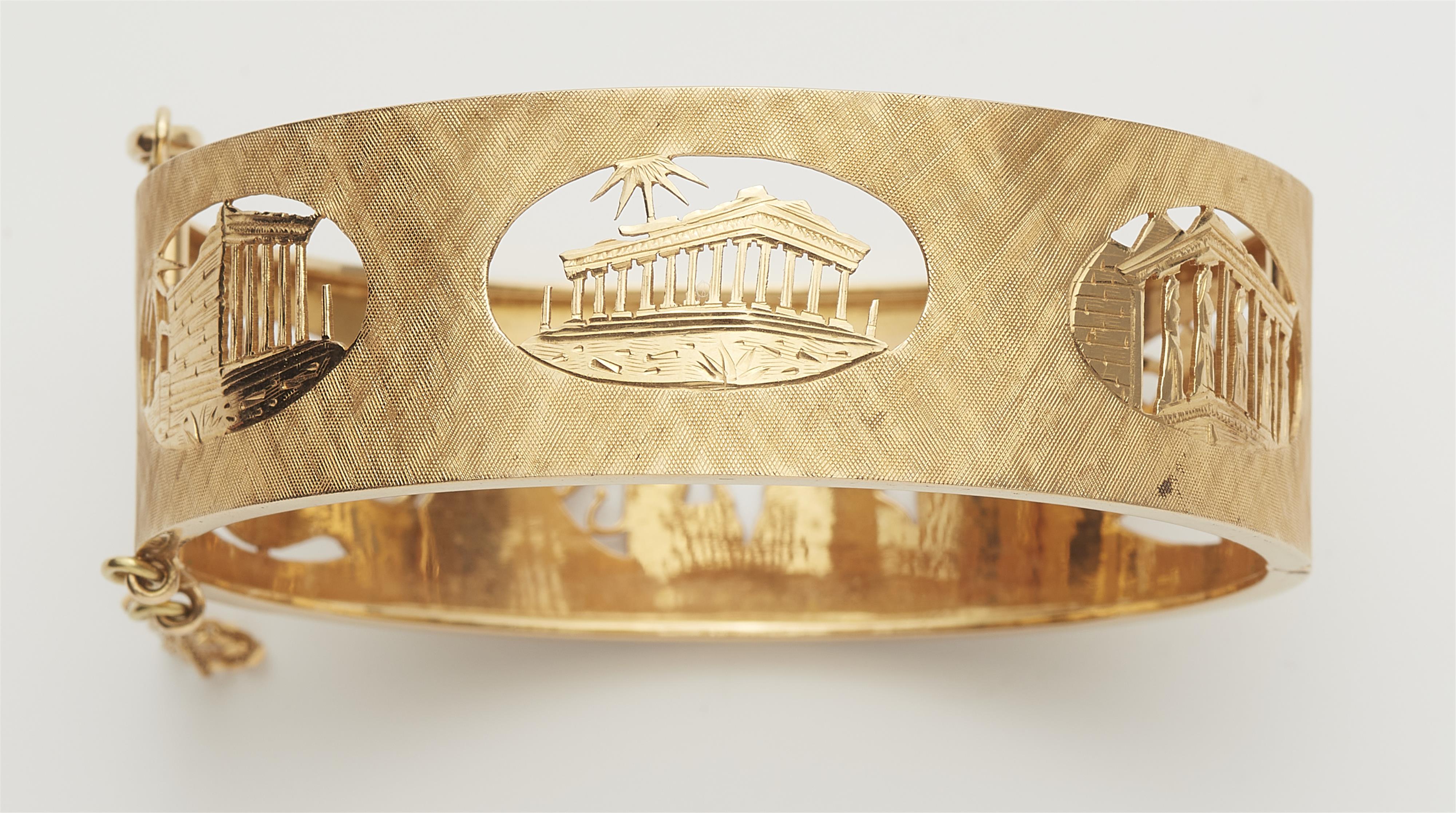 An 18k gold souvenir bangle with sights of the Acropolis. - image-2