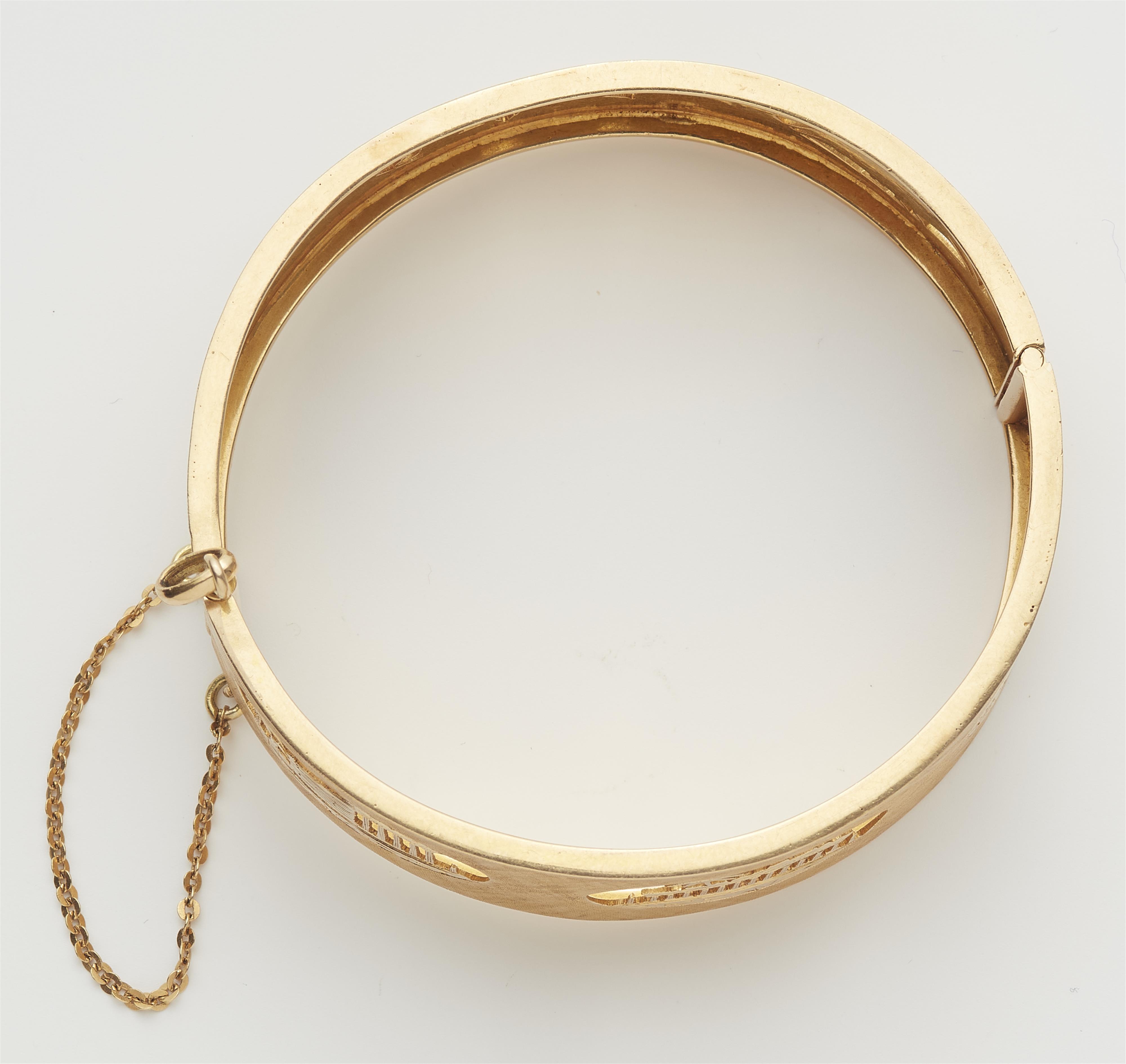 An 18k gold souvenir bangle with sights of the Acropolis. - image-3