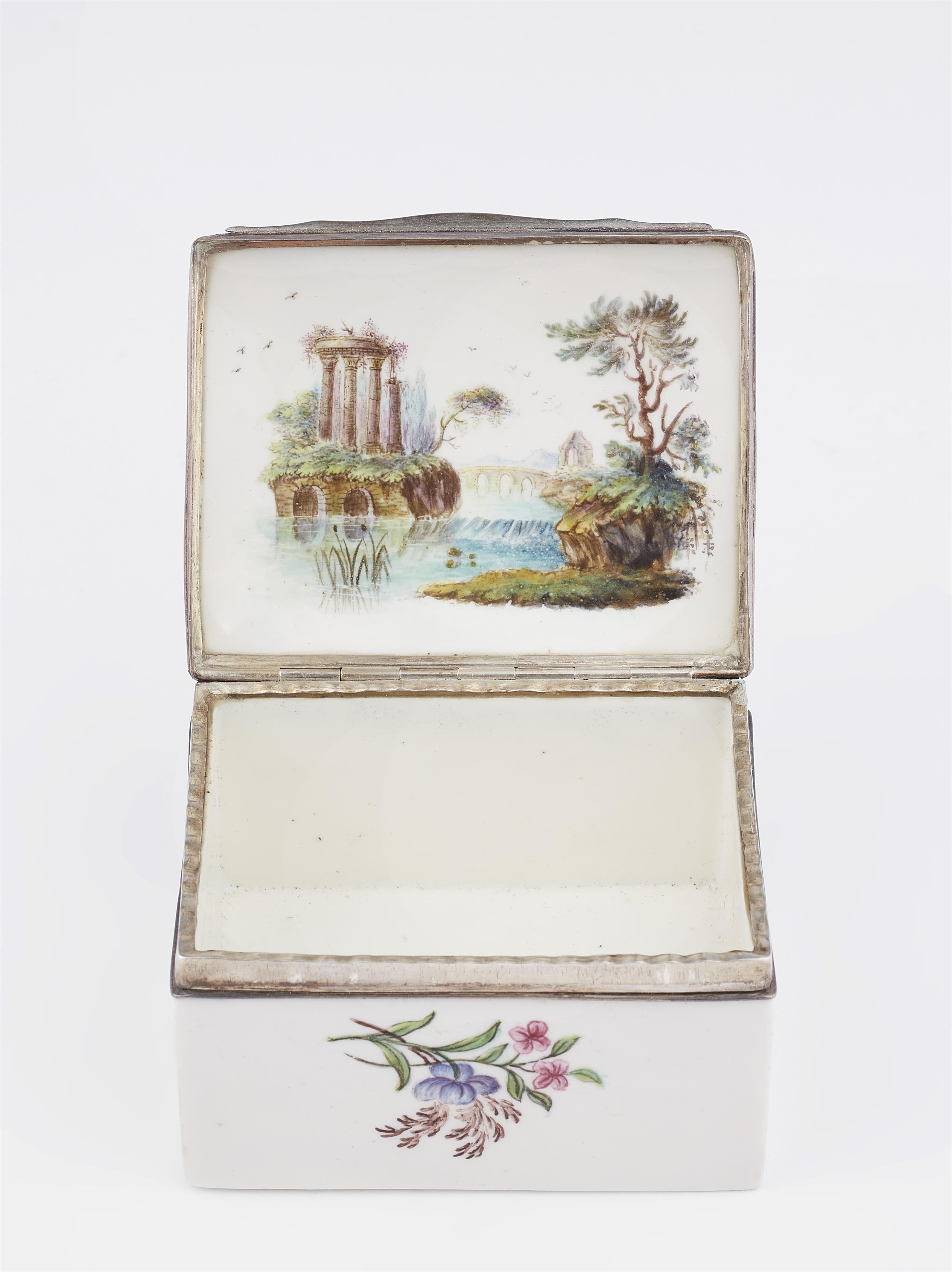 A porcelain snuff box with landscapes and garlands - image-2