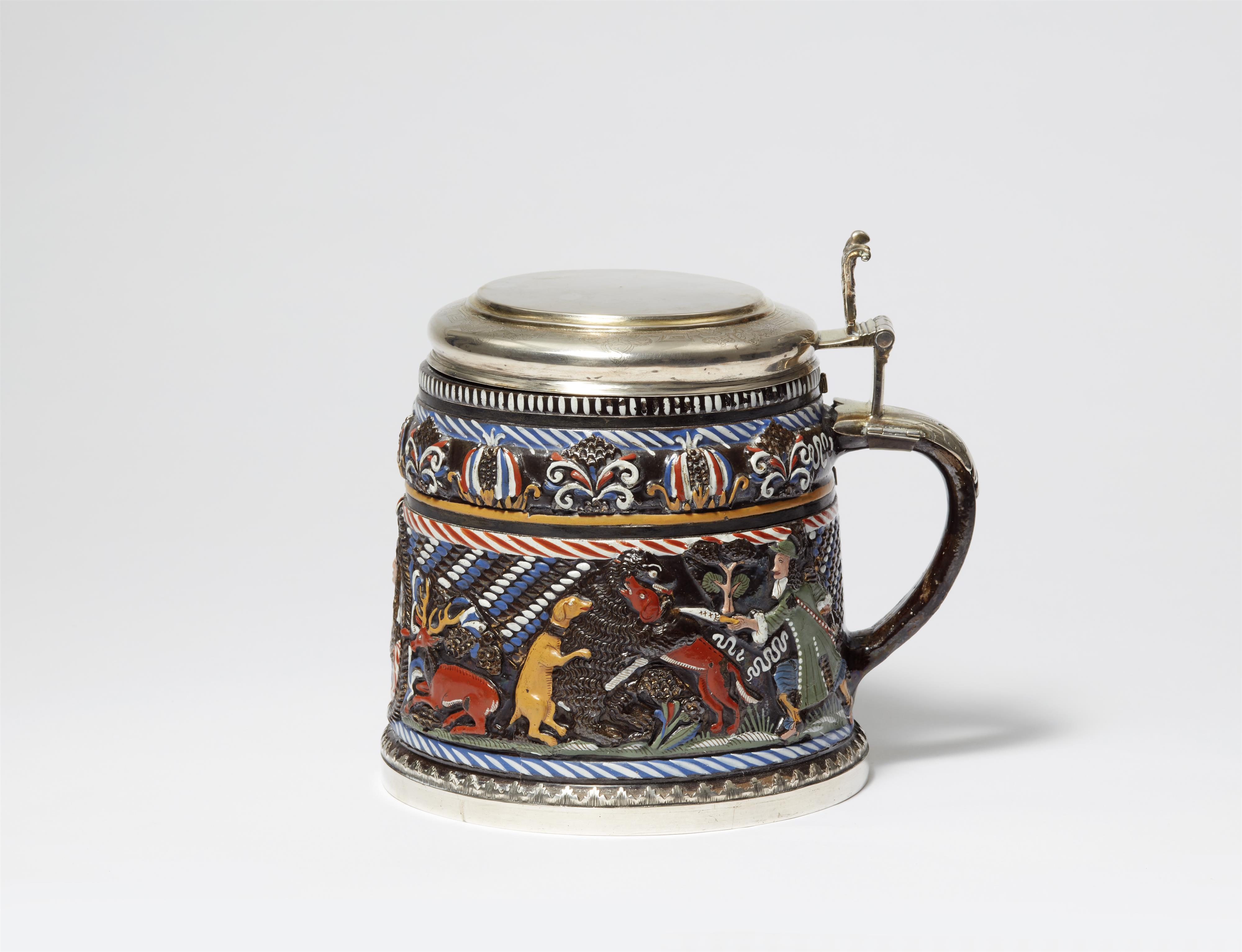 A stoneware hunting tankard from Dippoldiswalde - image-1