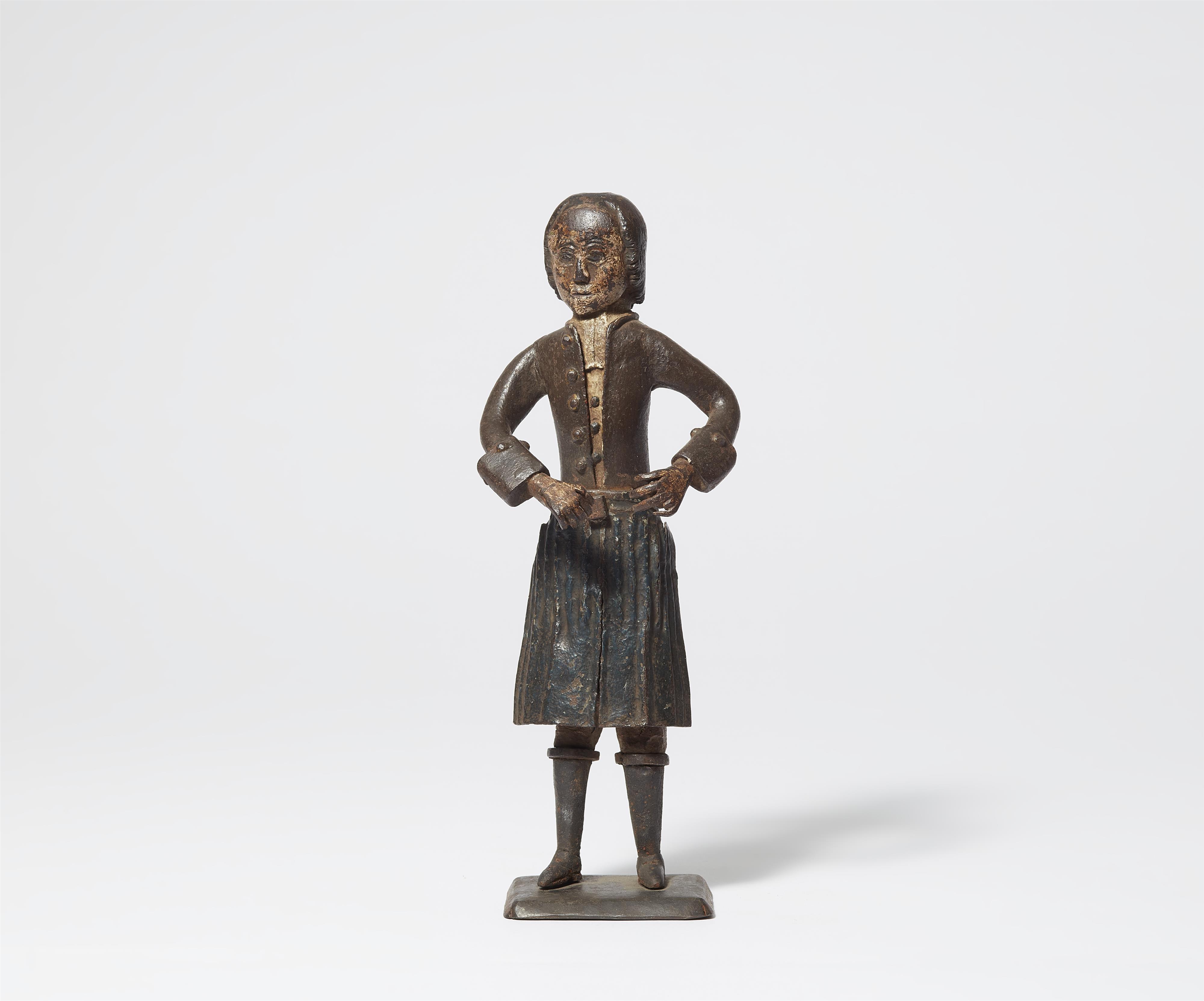 An 18th century German painted iron votive figure of a smith - image-1