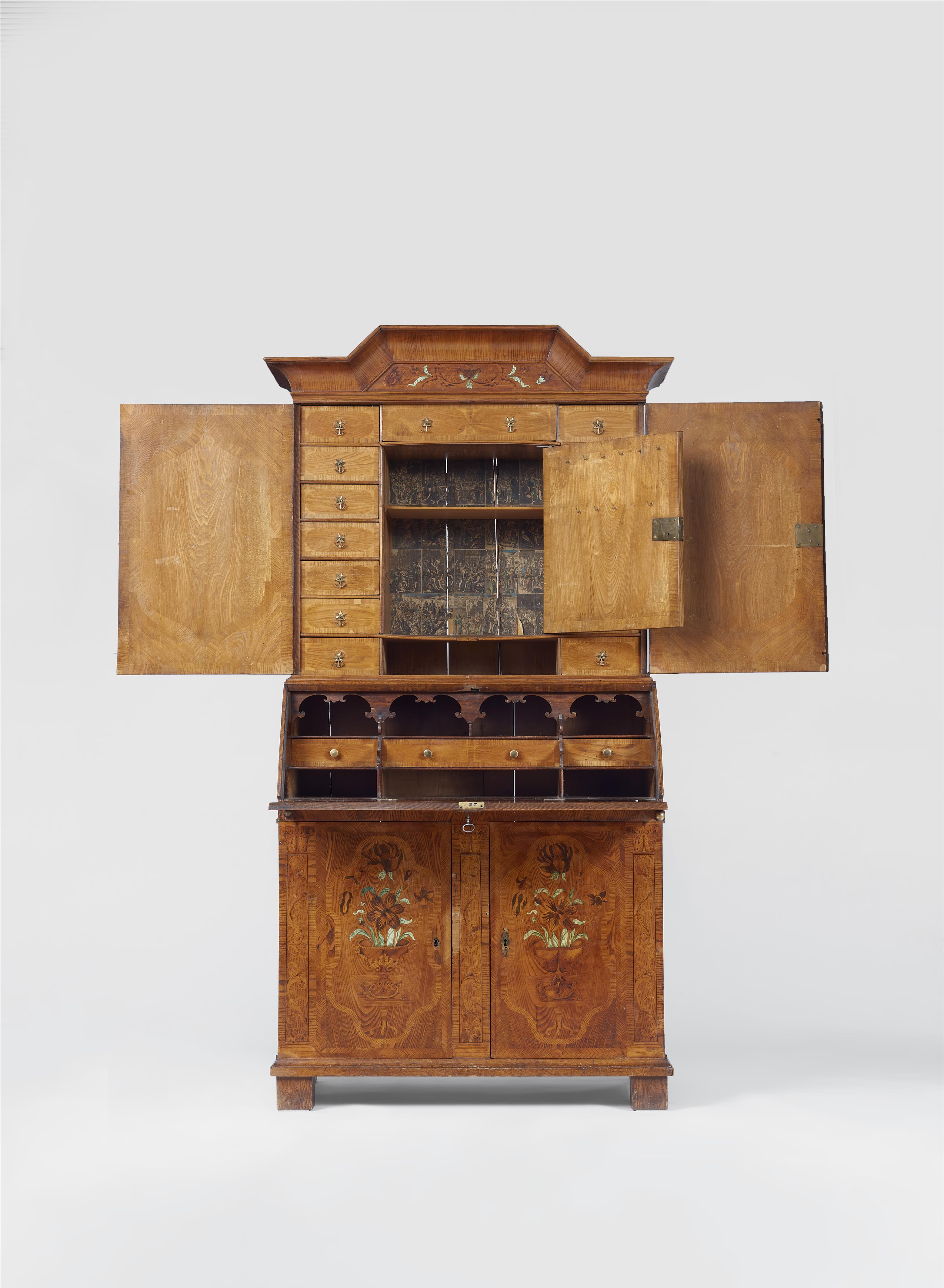 A German cabinet with unusual marquetry - image-2