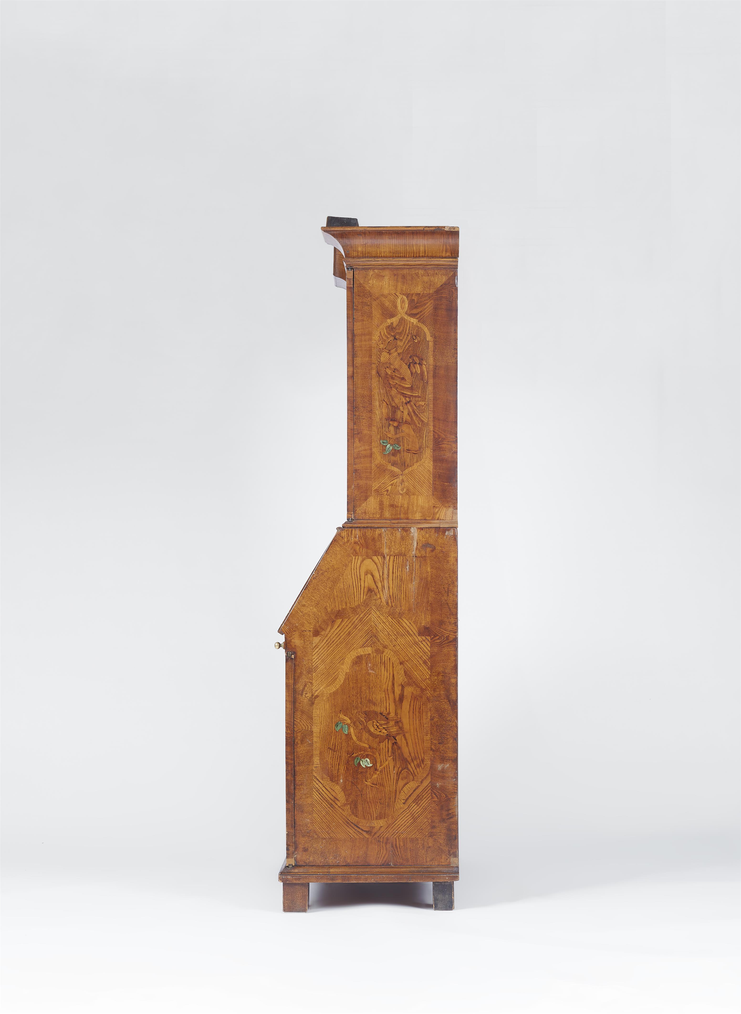 A German cabinet with unusual marquetry - image-3