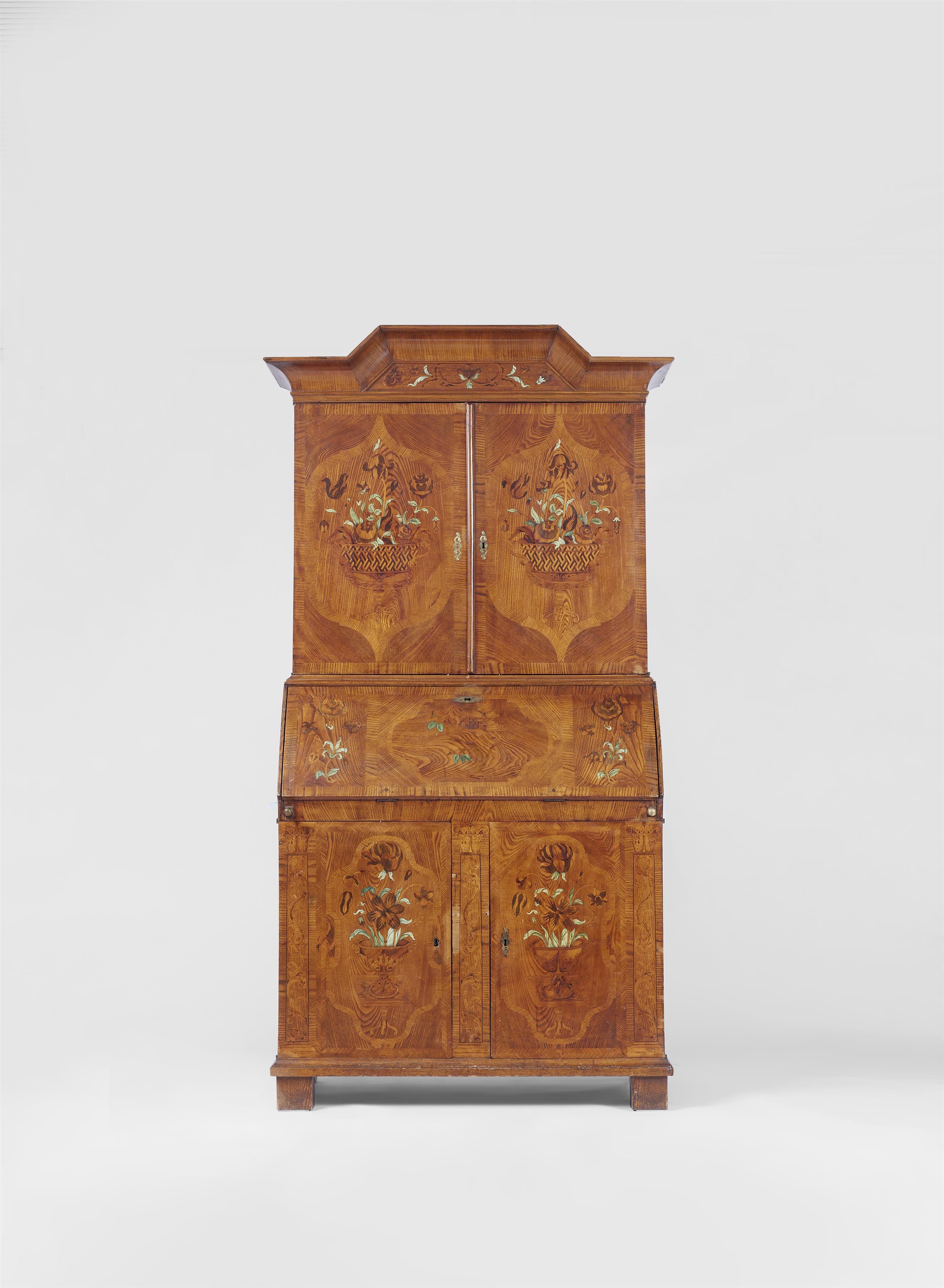 A German cabinet with unusual marquetry - image-1