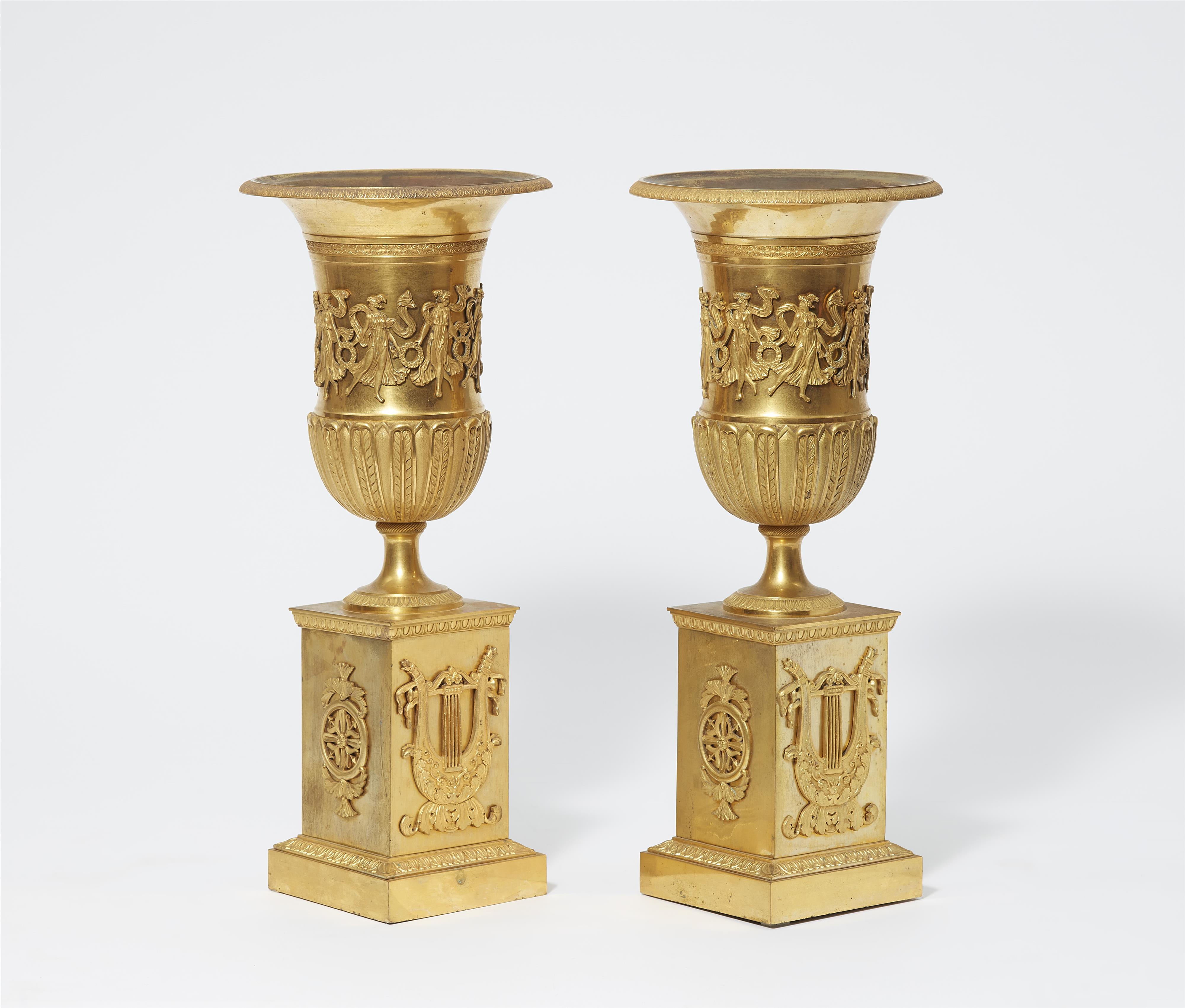 A pair of French ormolu vases with dancing maenads - image-1