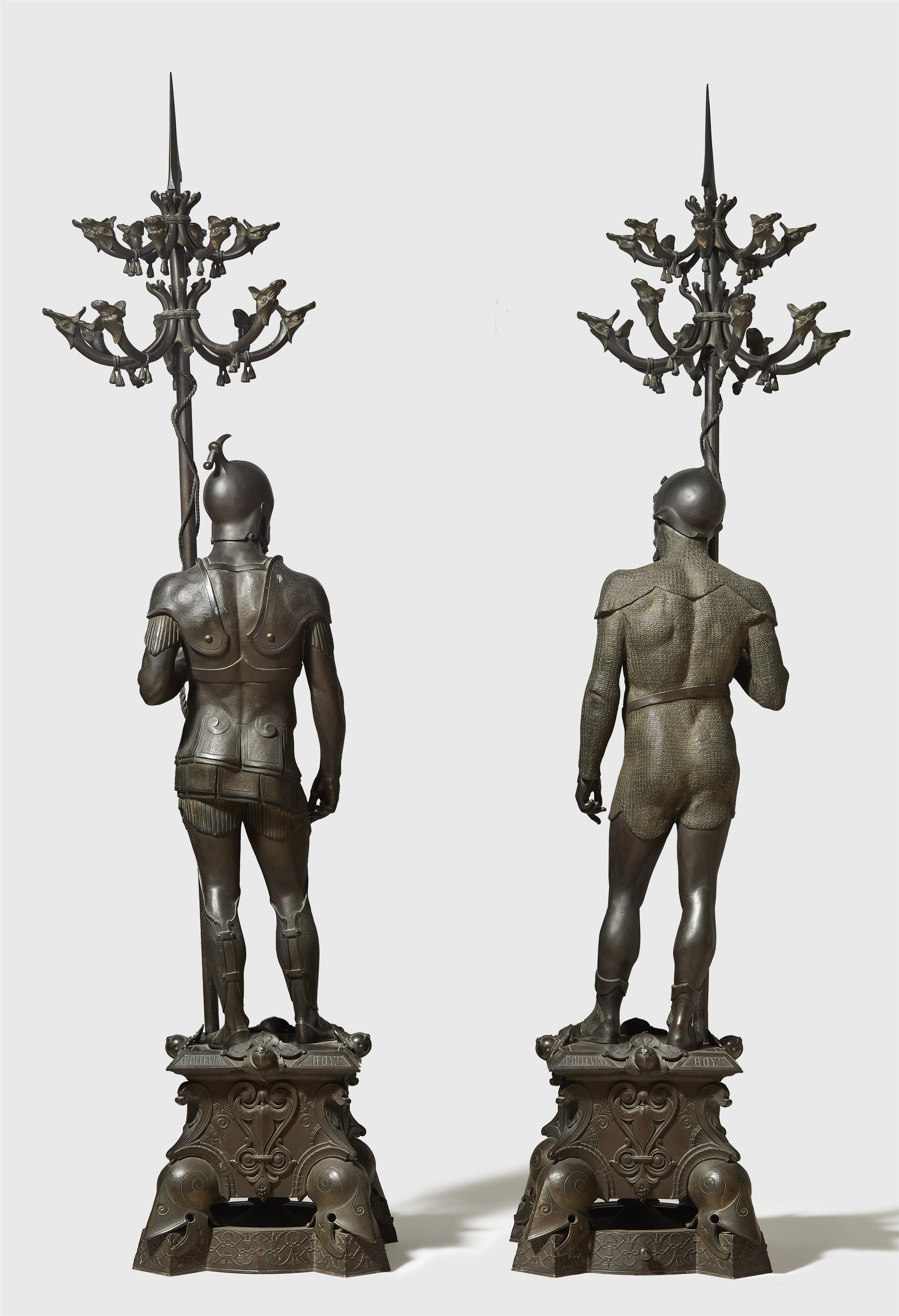 Two bronze figures of warriors holding candelabra - image-2