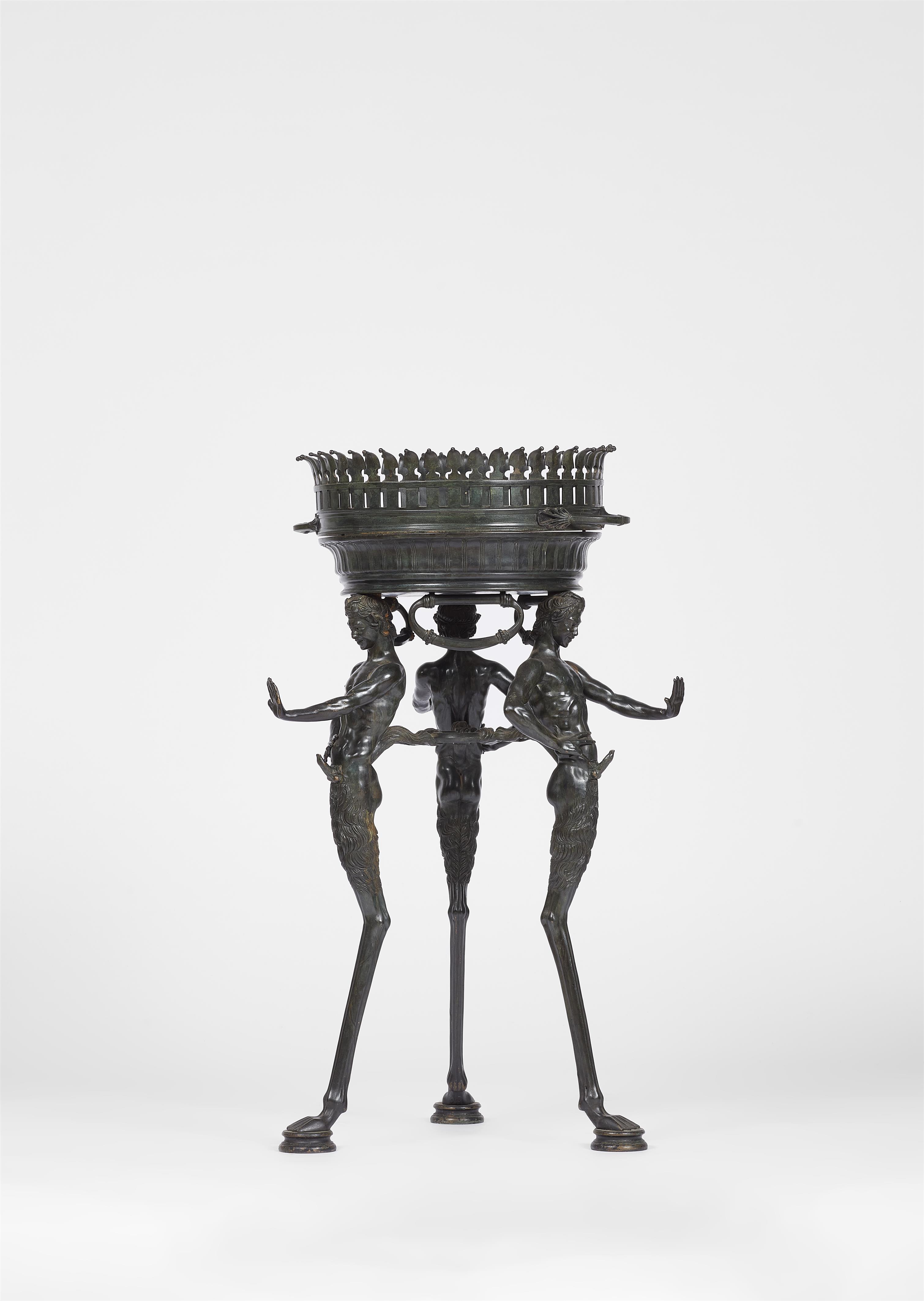 A patinated bronze tripod with three male figures - image-3