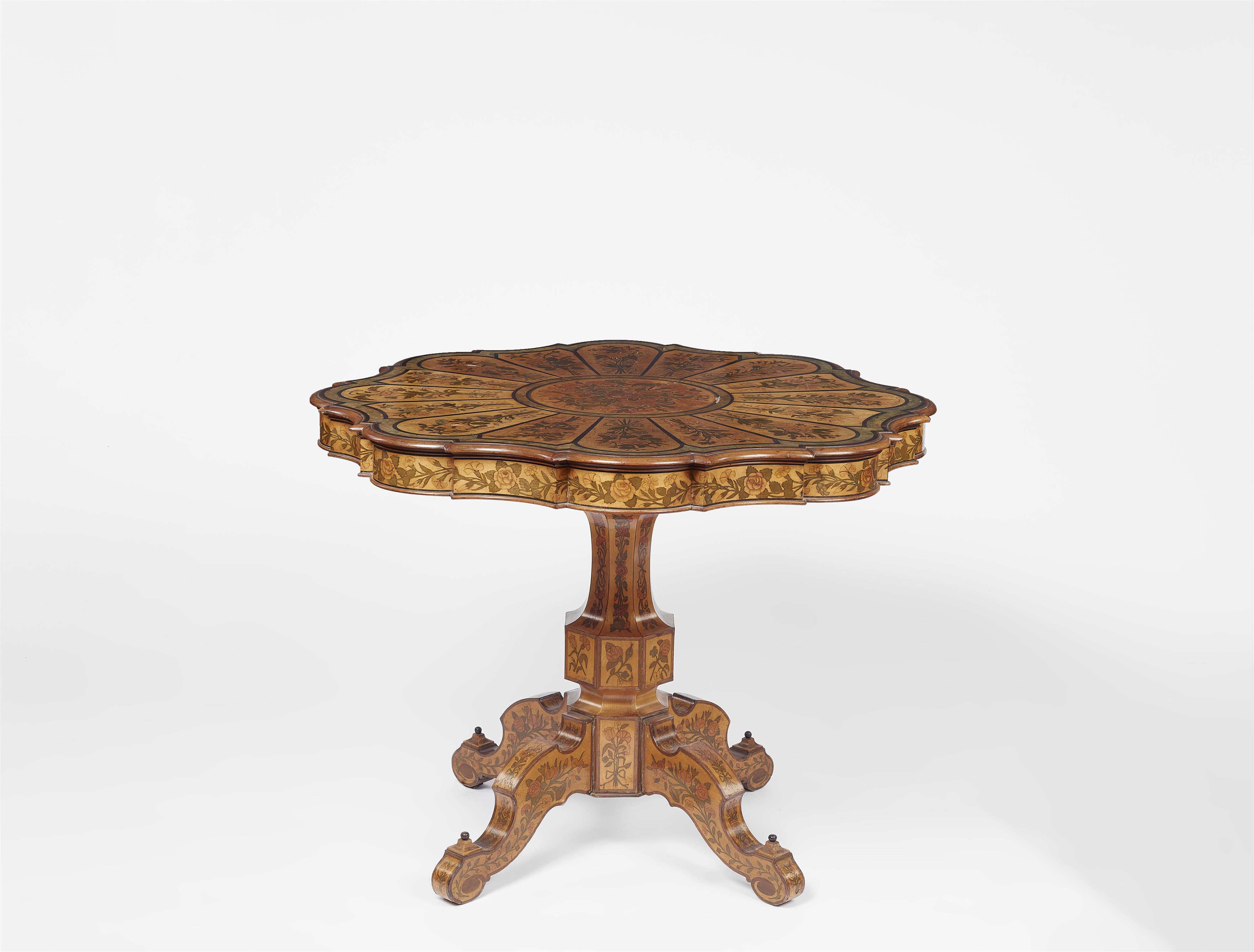 A marquetry inlaid saloon table - image-1