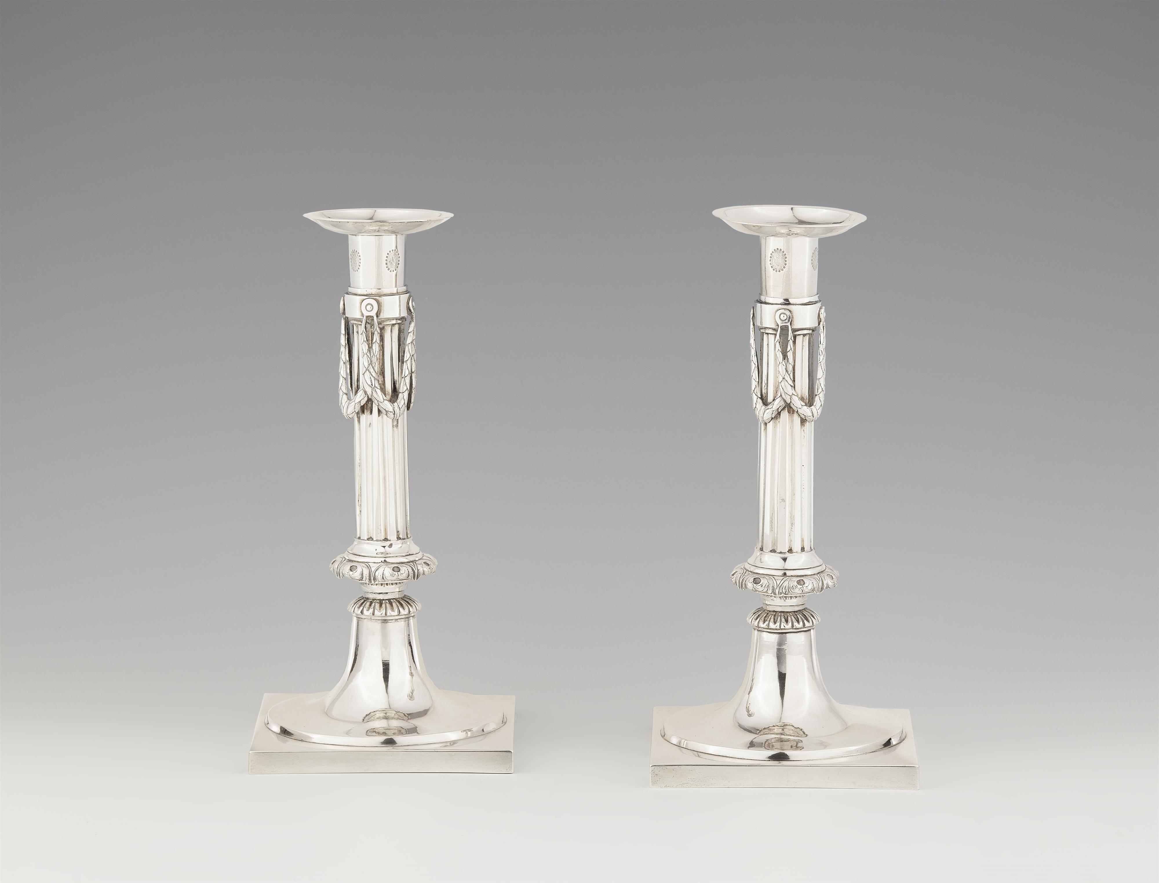 A pair of Neoclassical Augsburg silver candlesticks - image-1