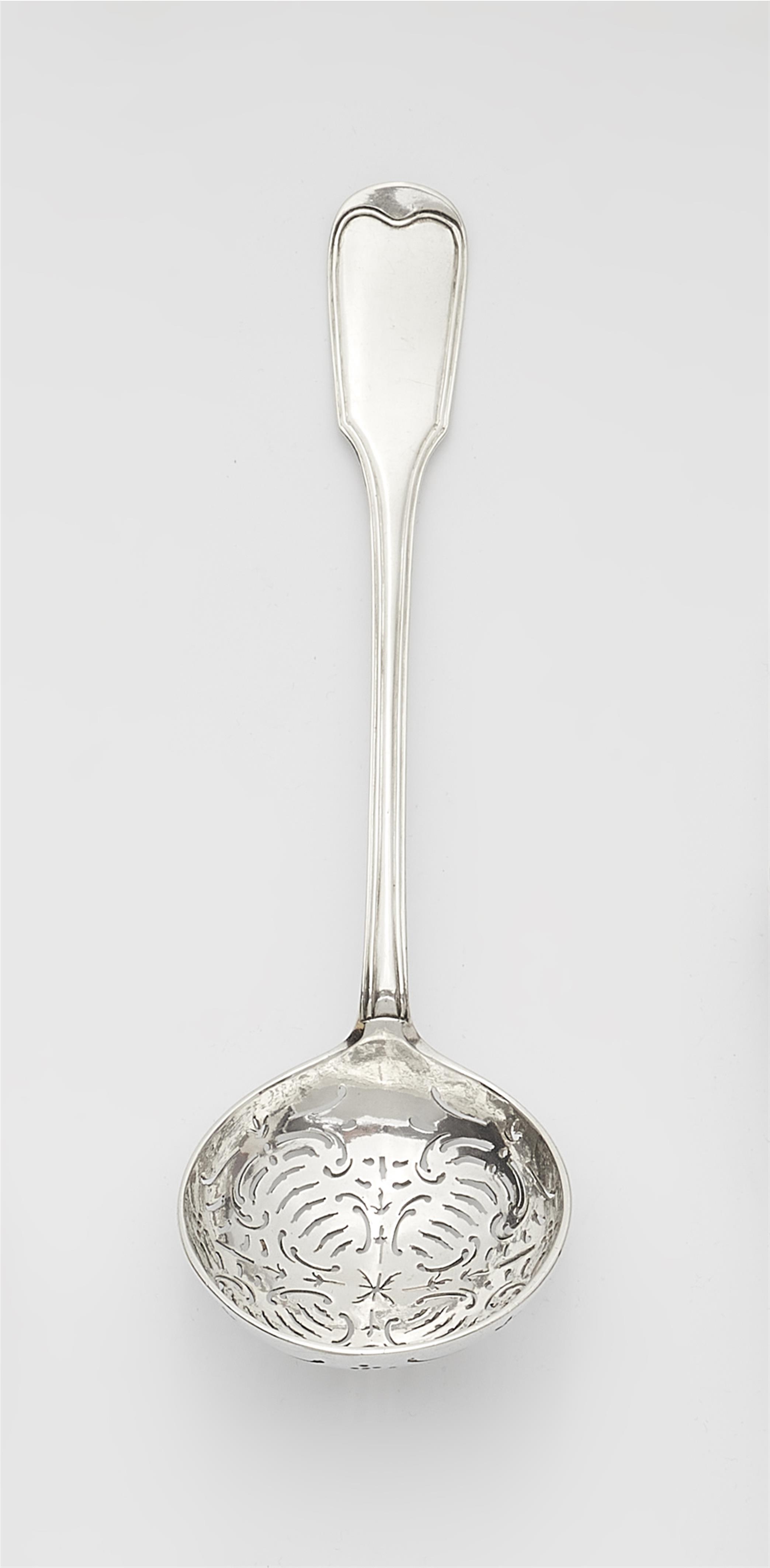 An Augsburg silver sugar casting spoon - image-1