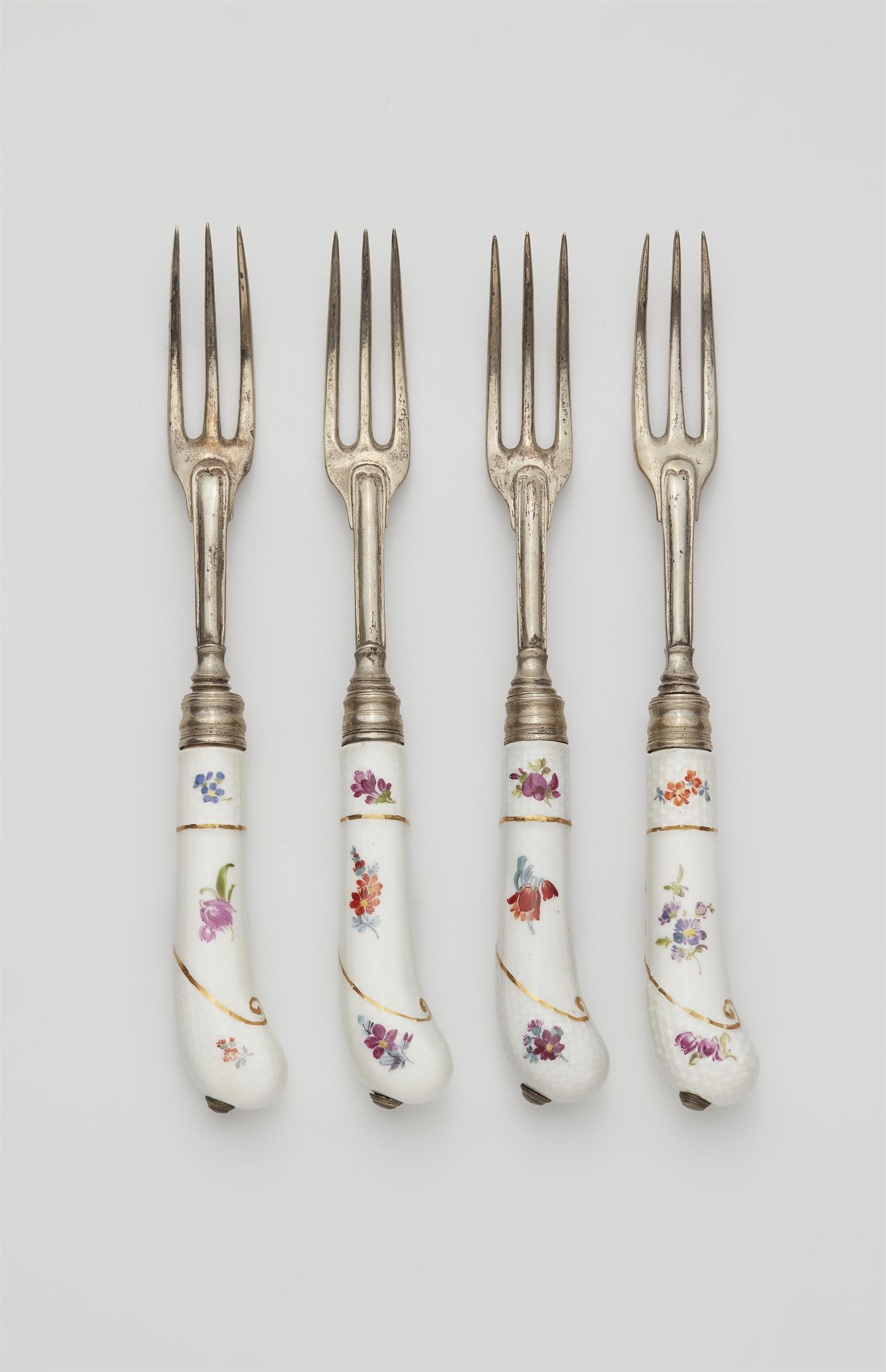 Four Augsburg silver forks with porcelain handles - image-1