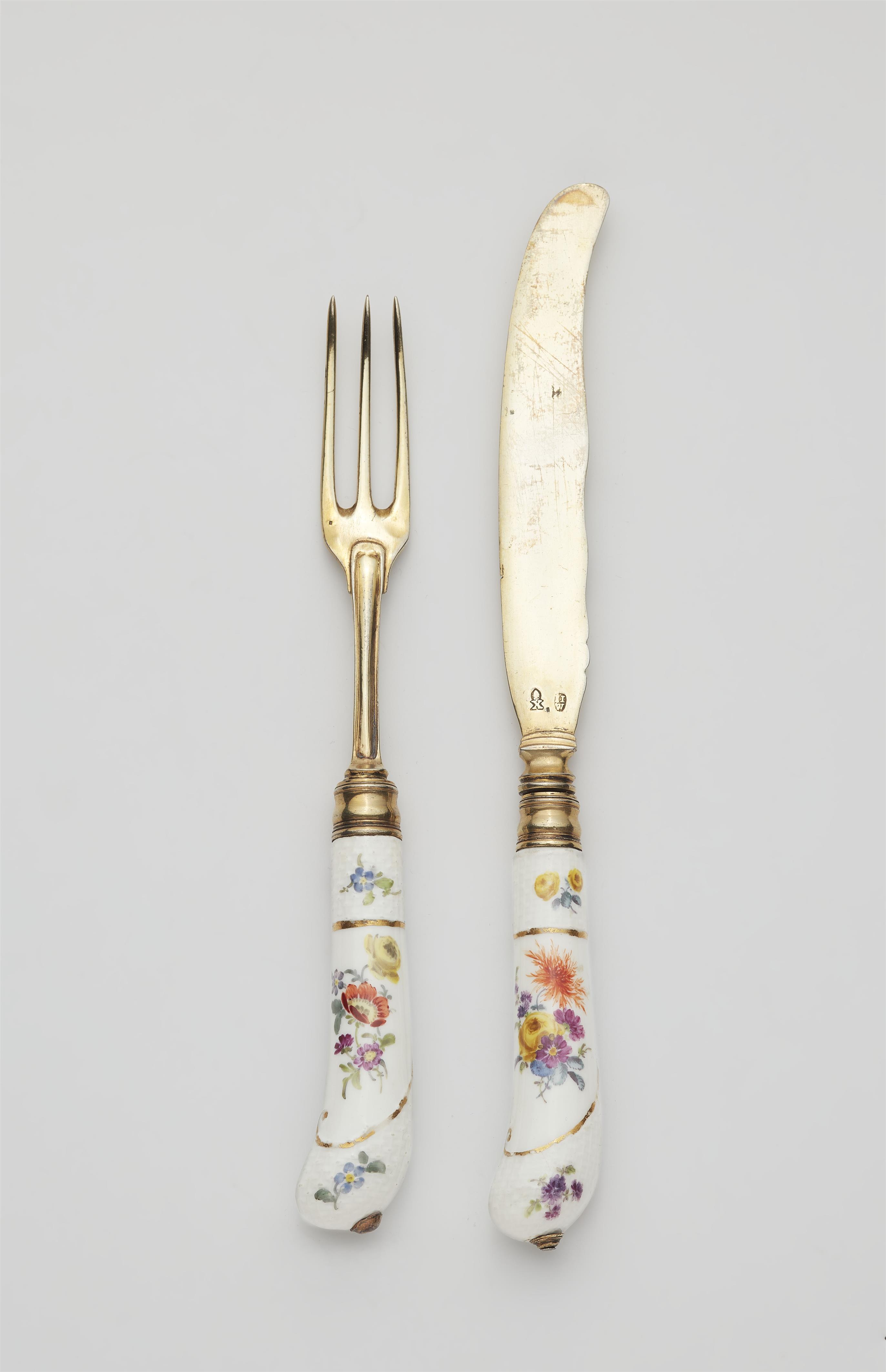 An Augsburg silver gilt knife and fork with porcelain handles - image-1