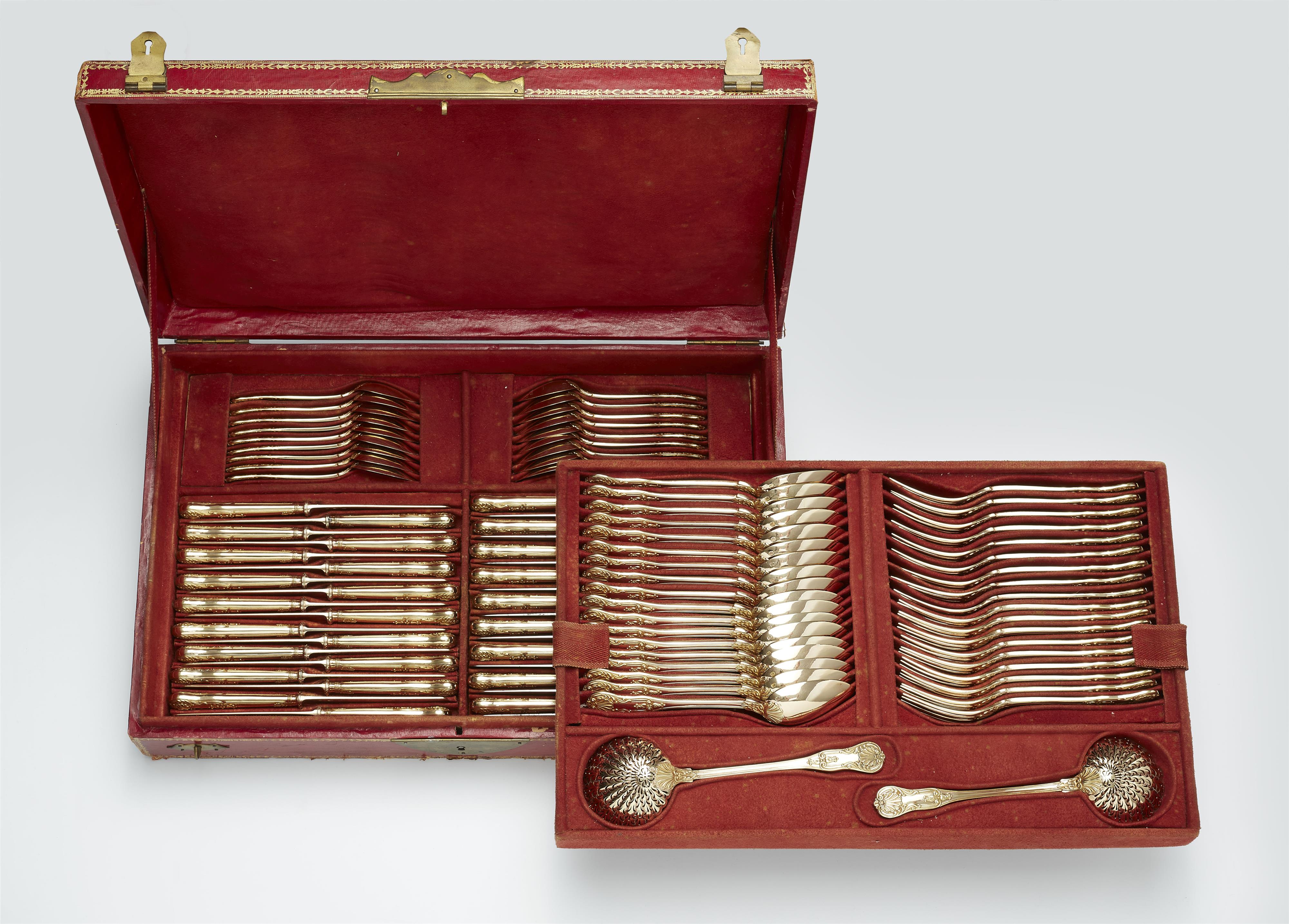 A Parisian silver gilt cutlery set in box - image-1