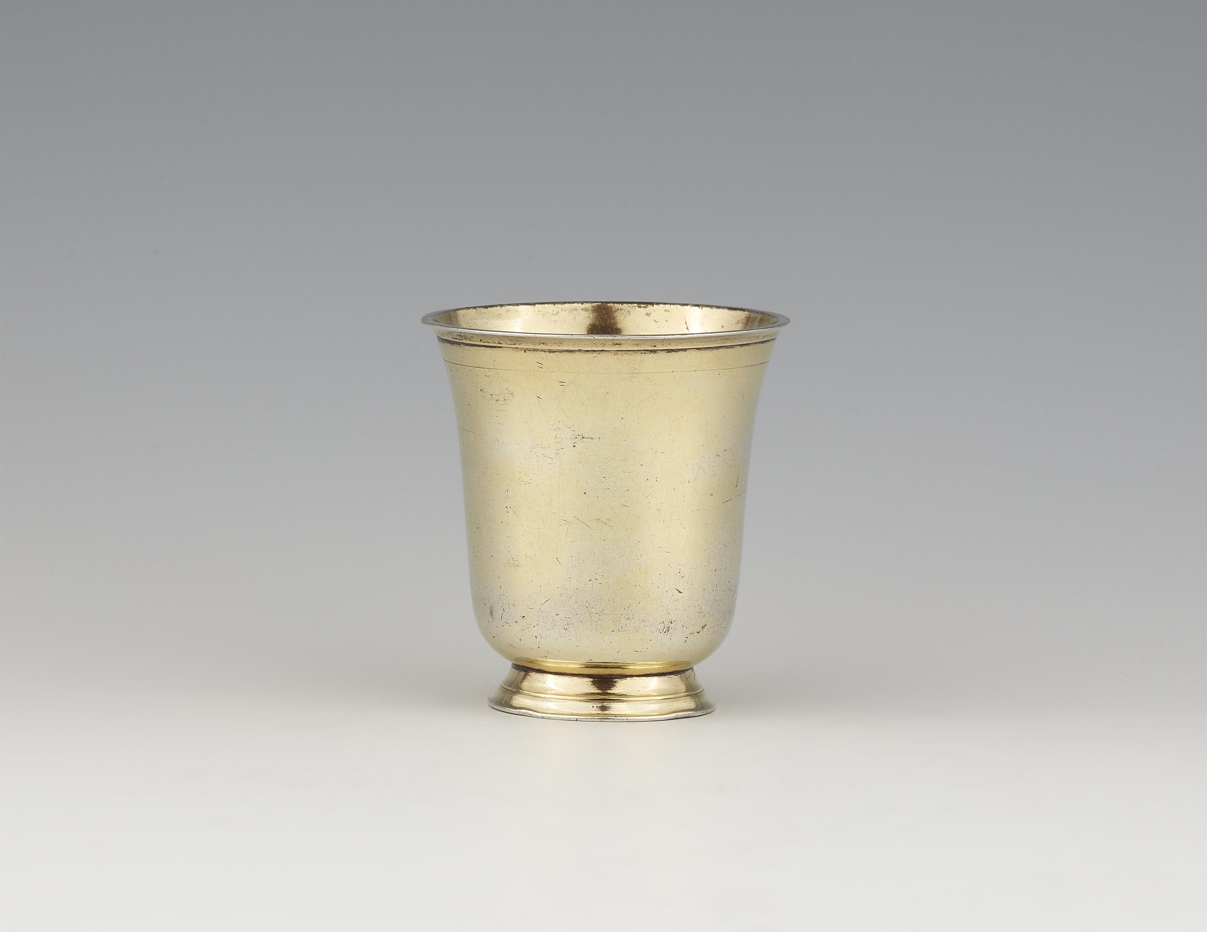 A small Swiss silver gilt tulip beaker - image-1