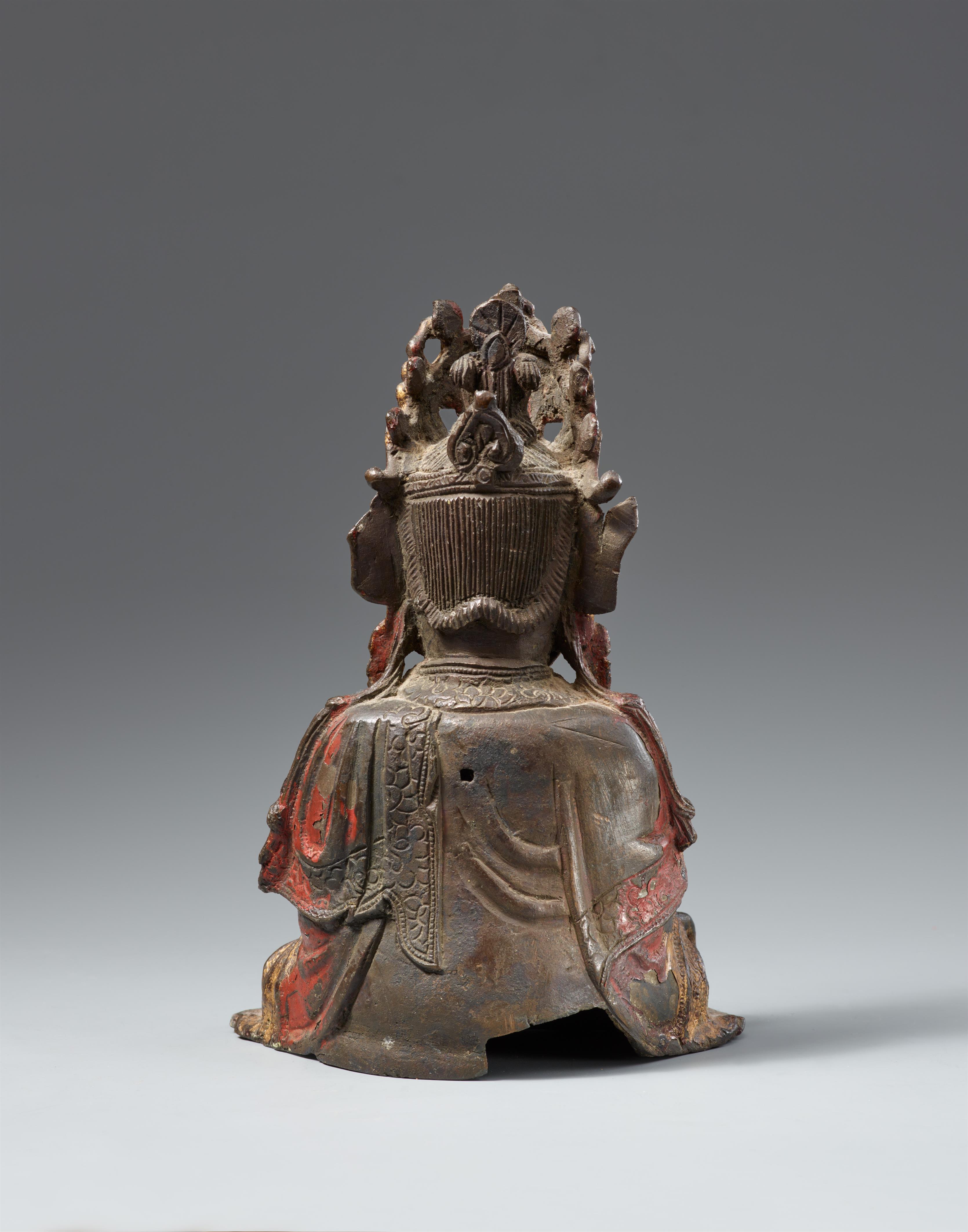 A gilded and lacquered bronze figure of Guanyin. Ming dynasty - image-2