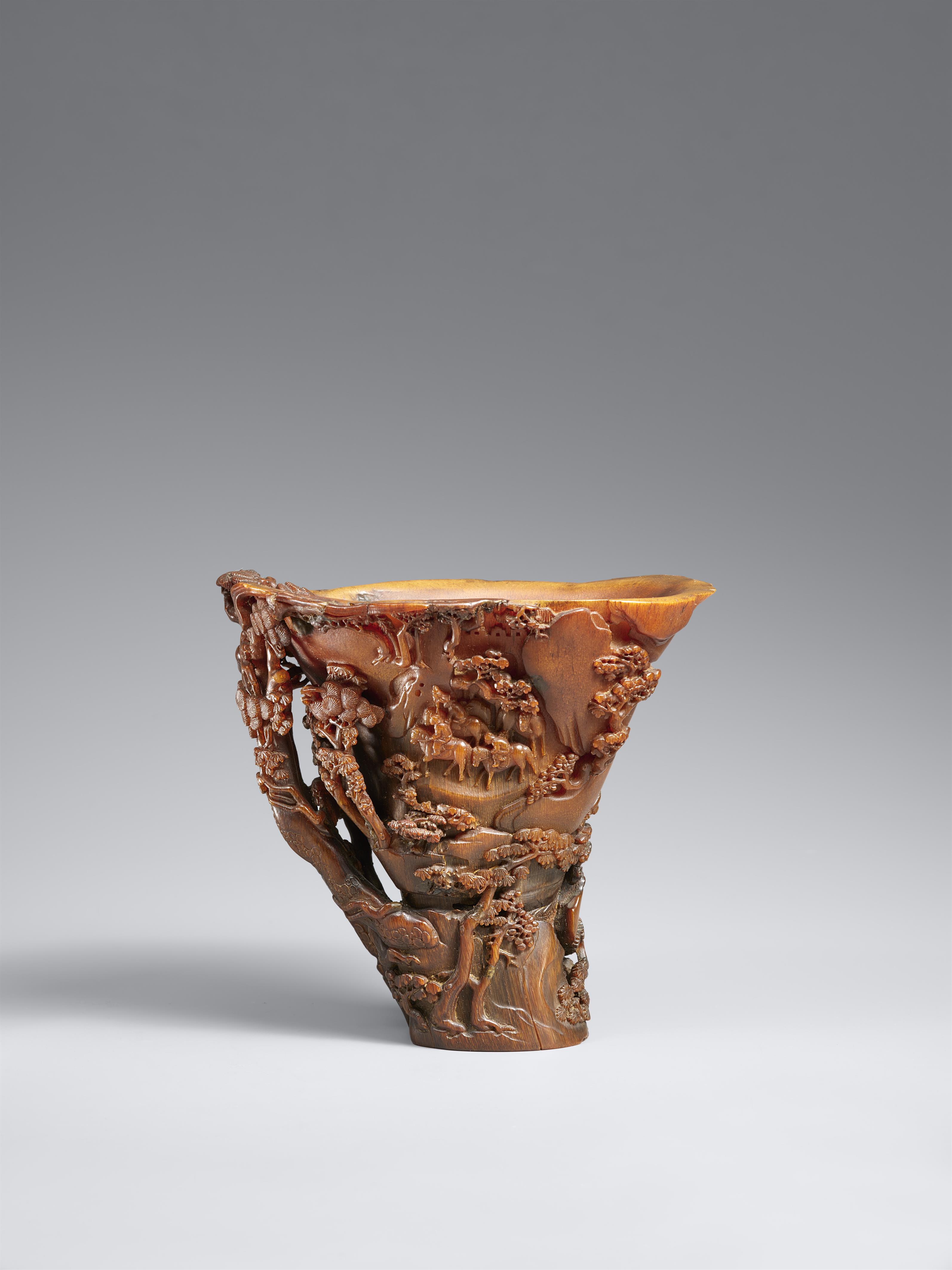 A superbly carved rhinoceros horn libation cup. 17th century - image-1