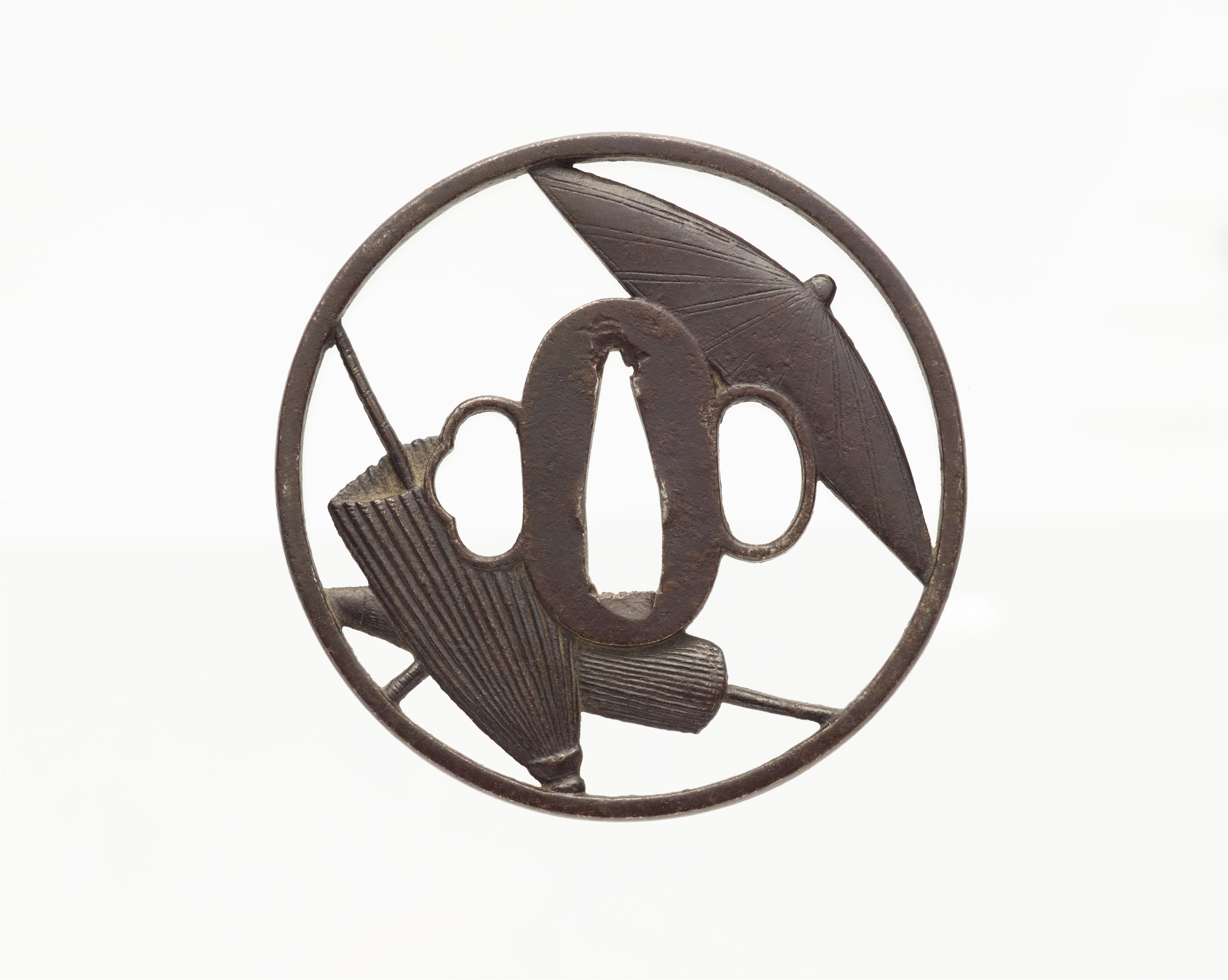 An iron tsuba. Possibly Higo. Edo period - image-2