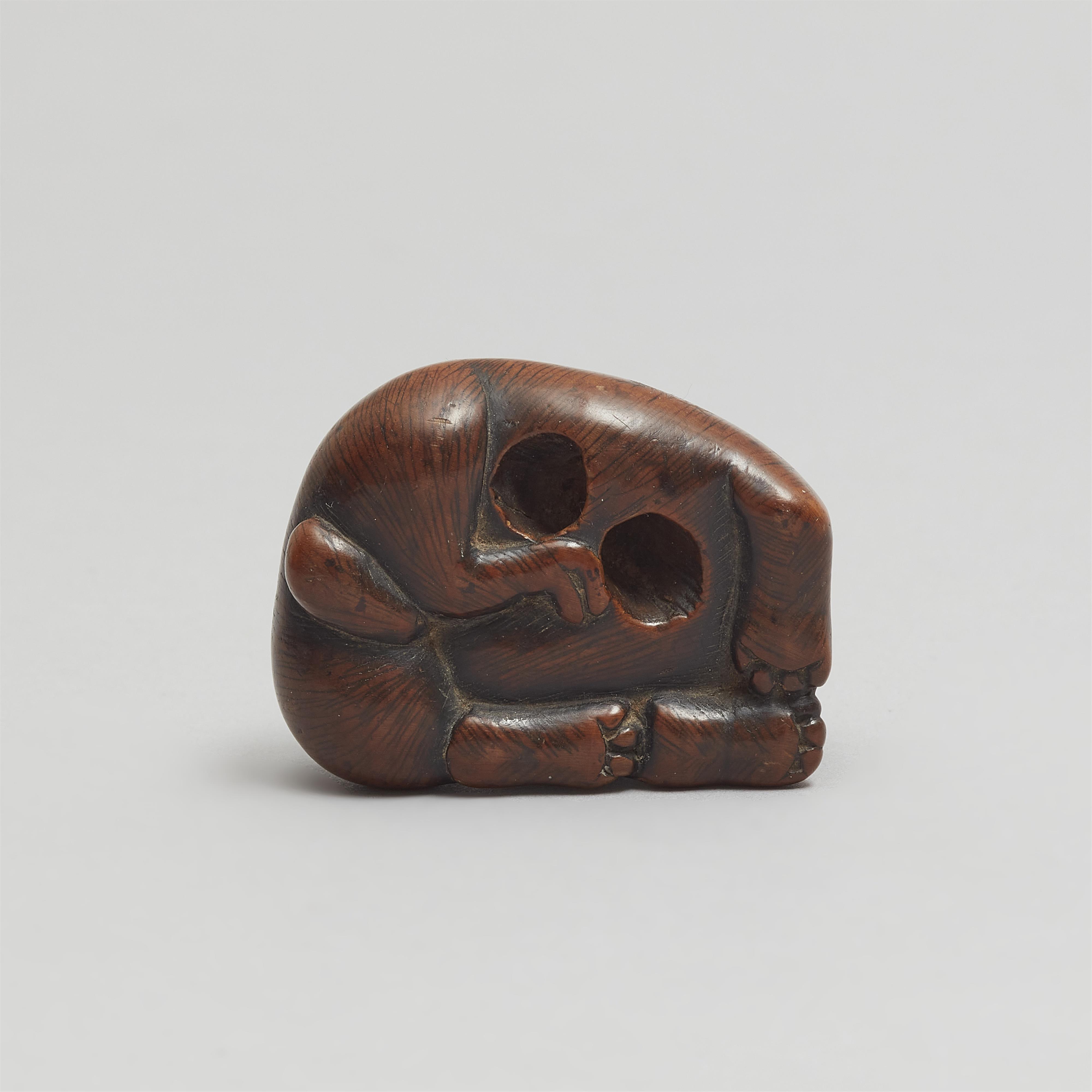 A large boxwood netsuke of a puppy. Early 19th century - image-9