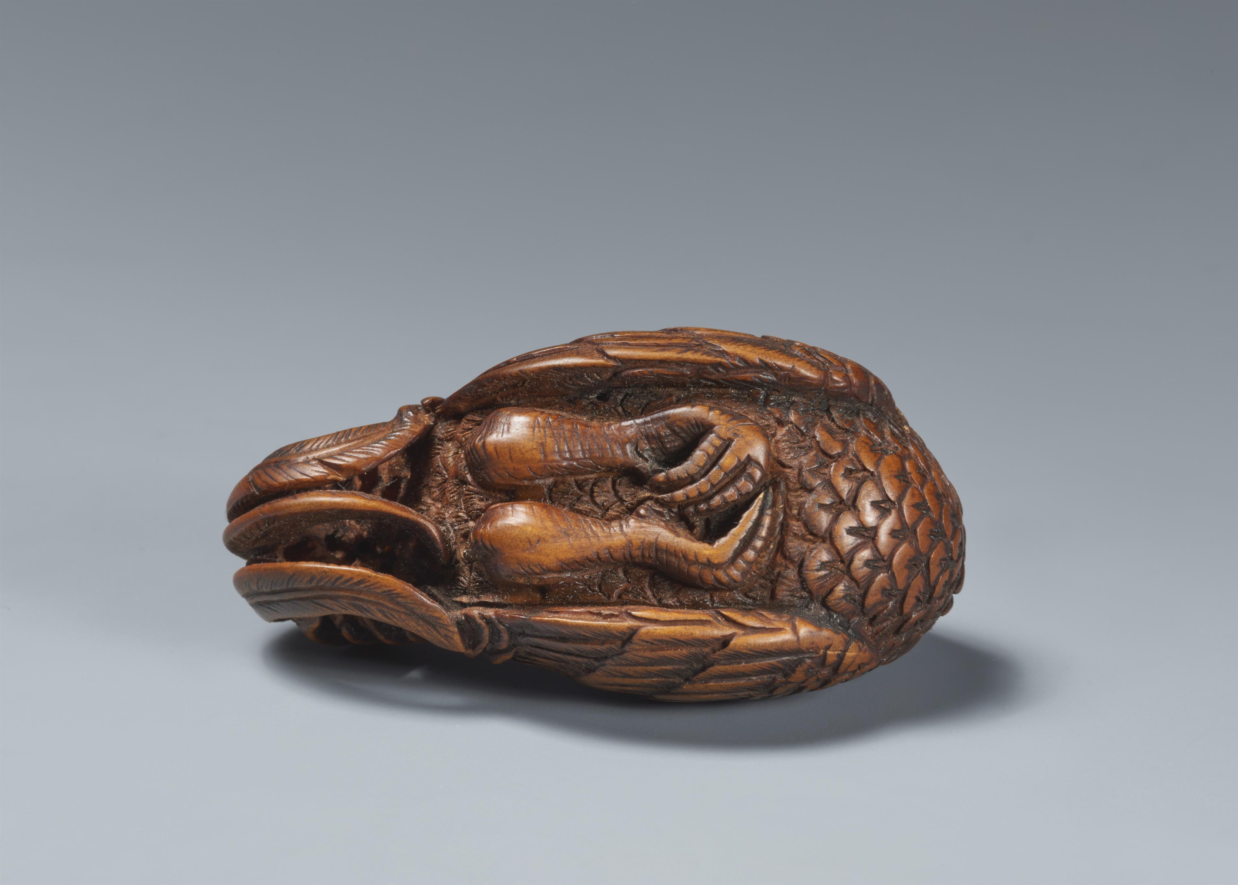 A wood netsuke of a proud rooster. - image-5