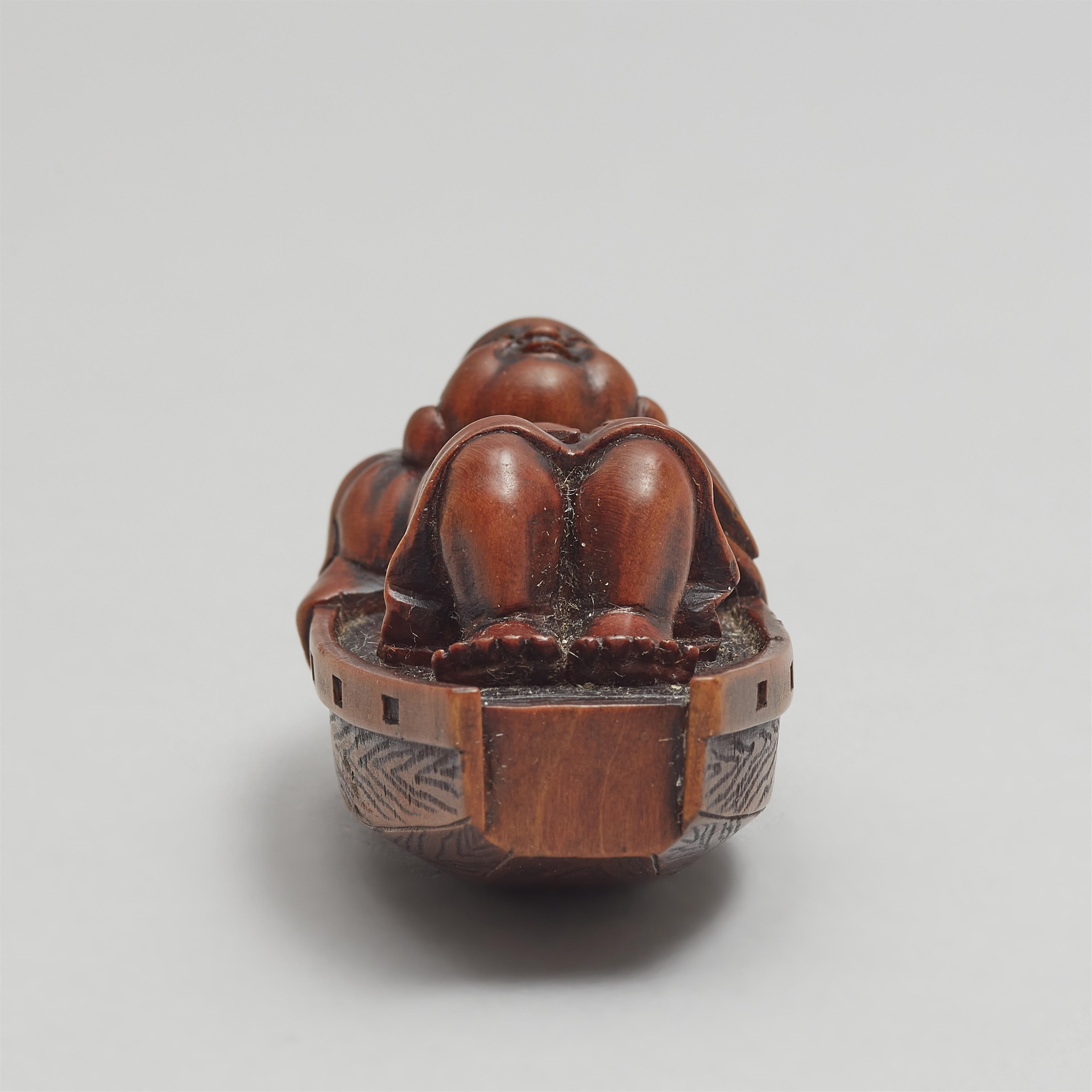 A boxwood netsuke of Hotei resting in a boat. Late 19th century - image-8