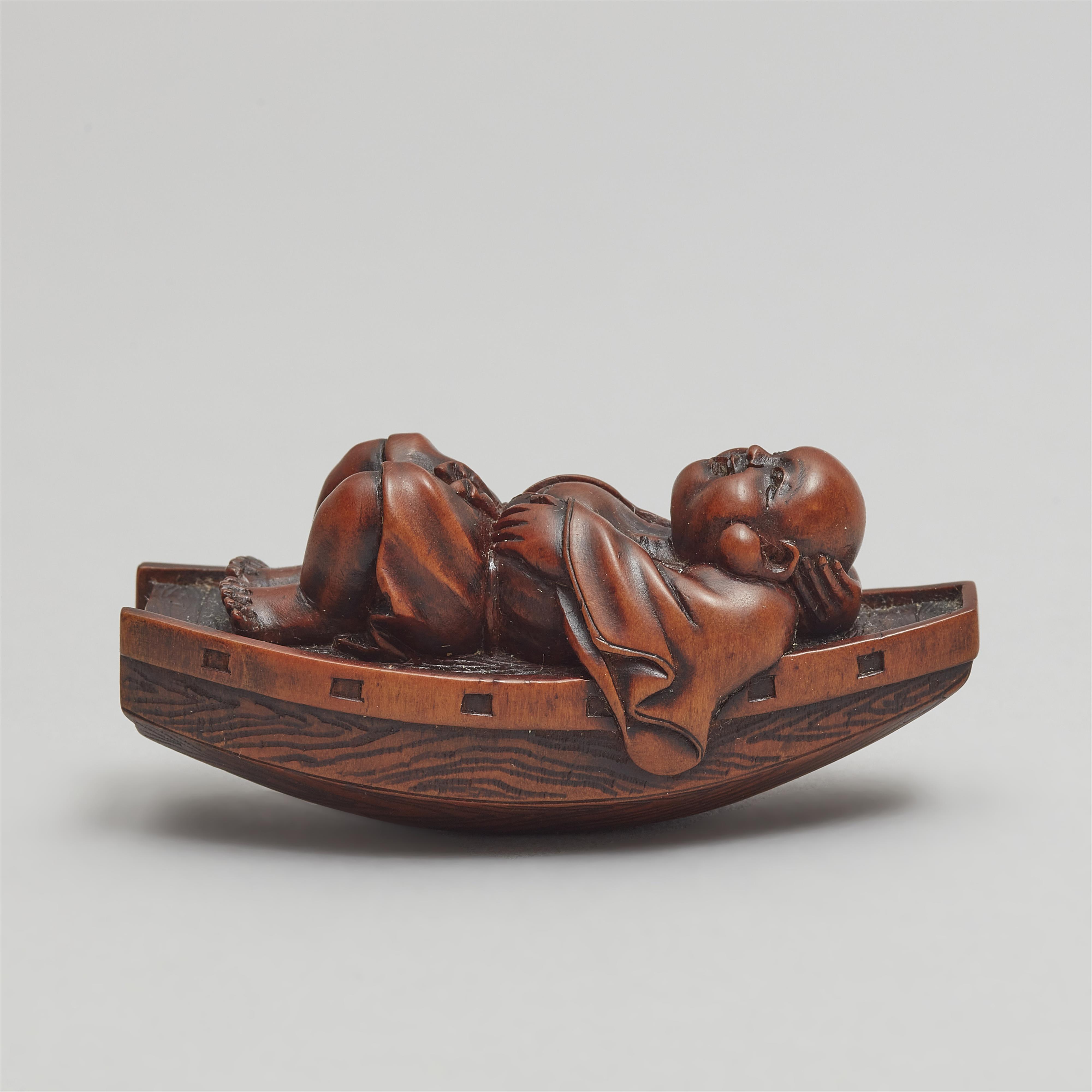 A boxwood netsuke of Hotei resting in a boat. Late 19th century - image-9