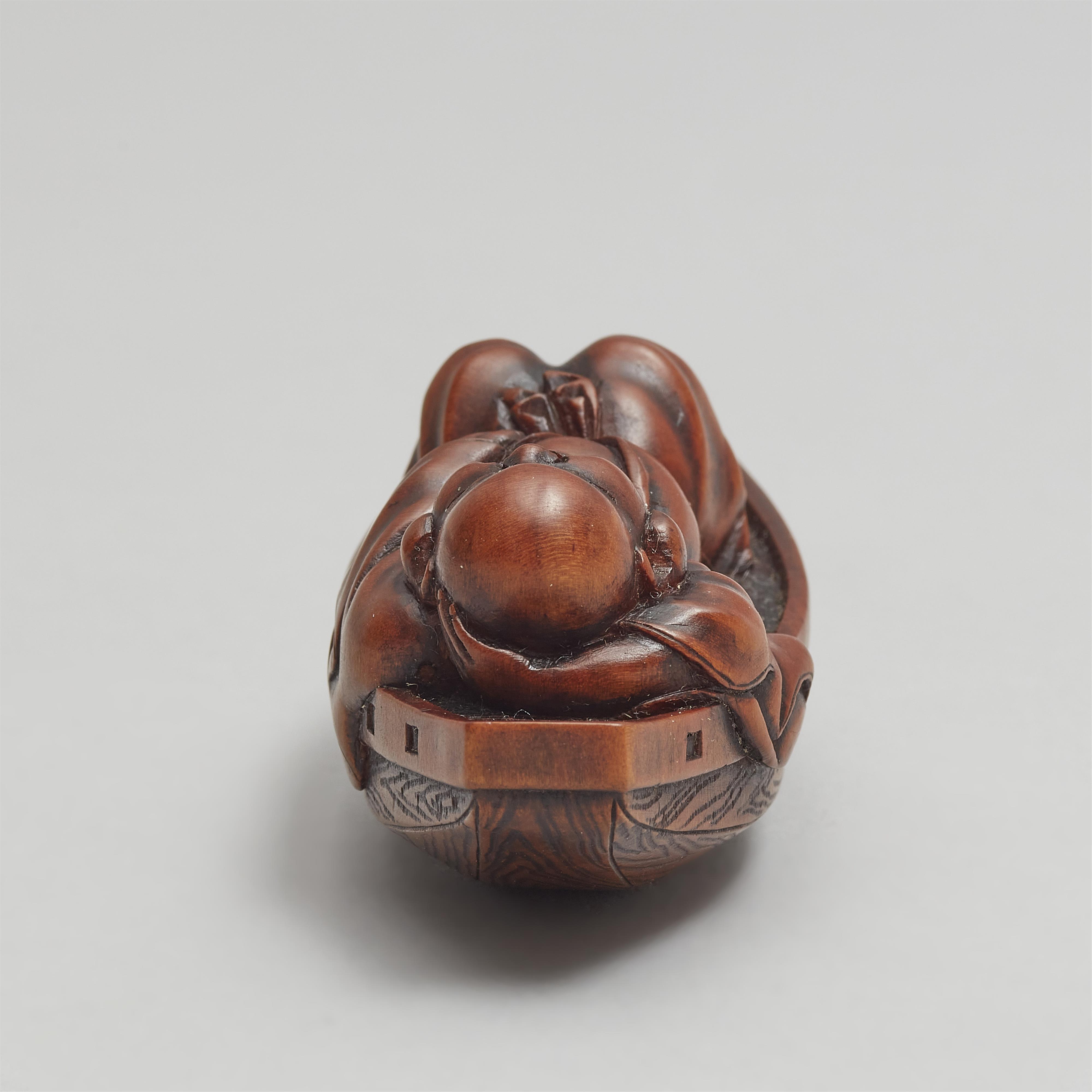 A boxwood netsuke of Hotei resting in a boat. Late 19th century - image-10