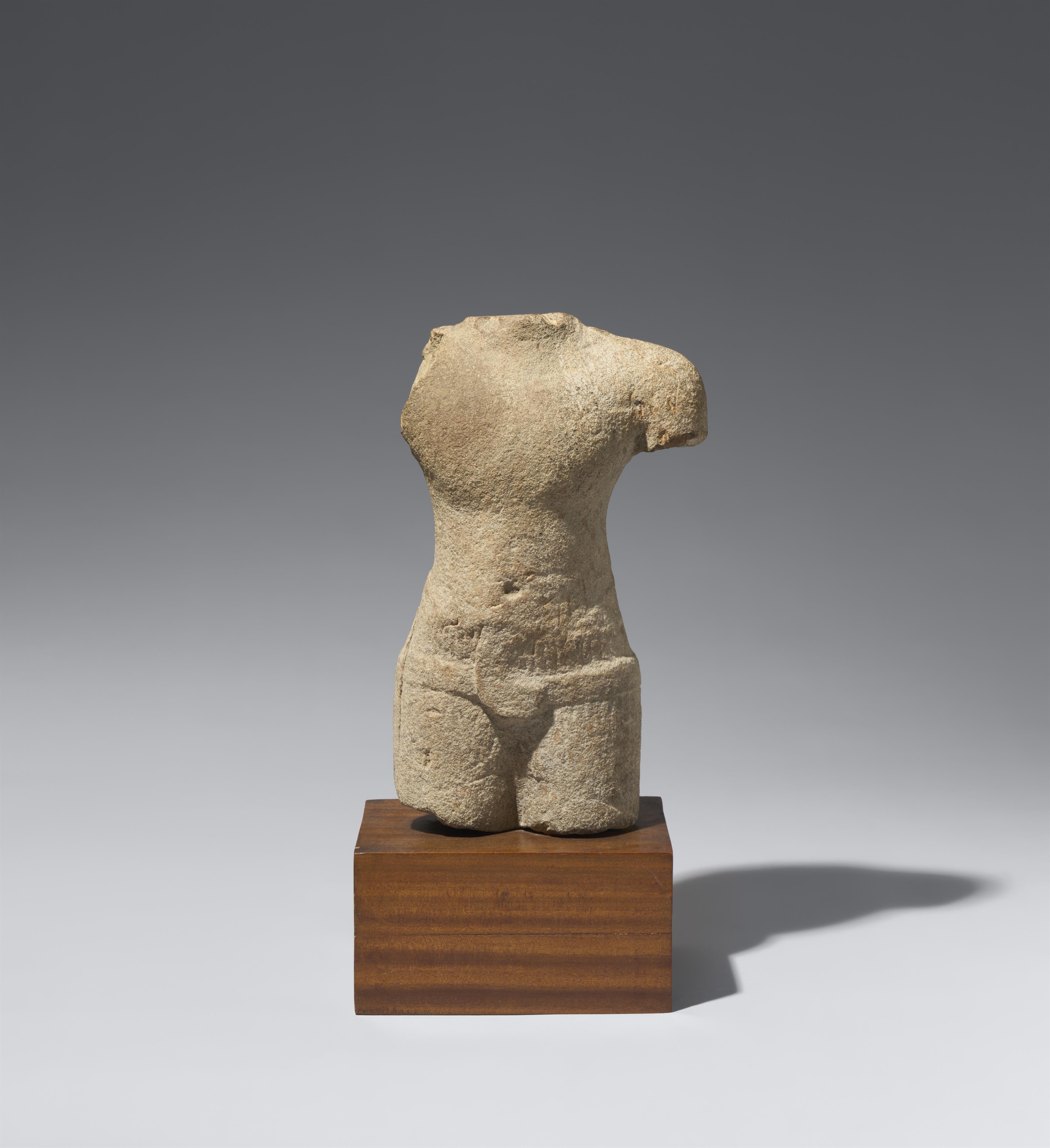 A Baphuon-style sandstone torso. Cambodia. Second half 11th century - image-1