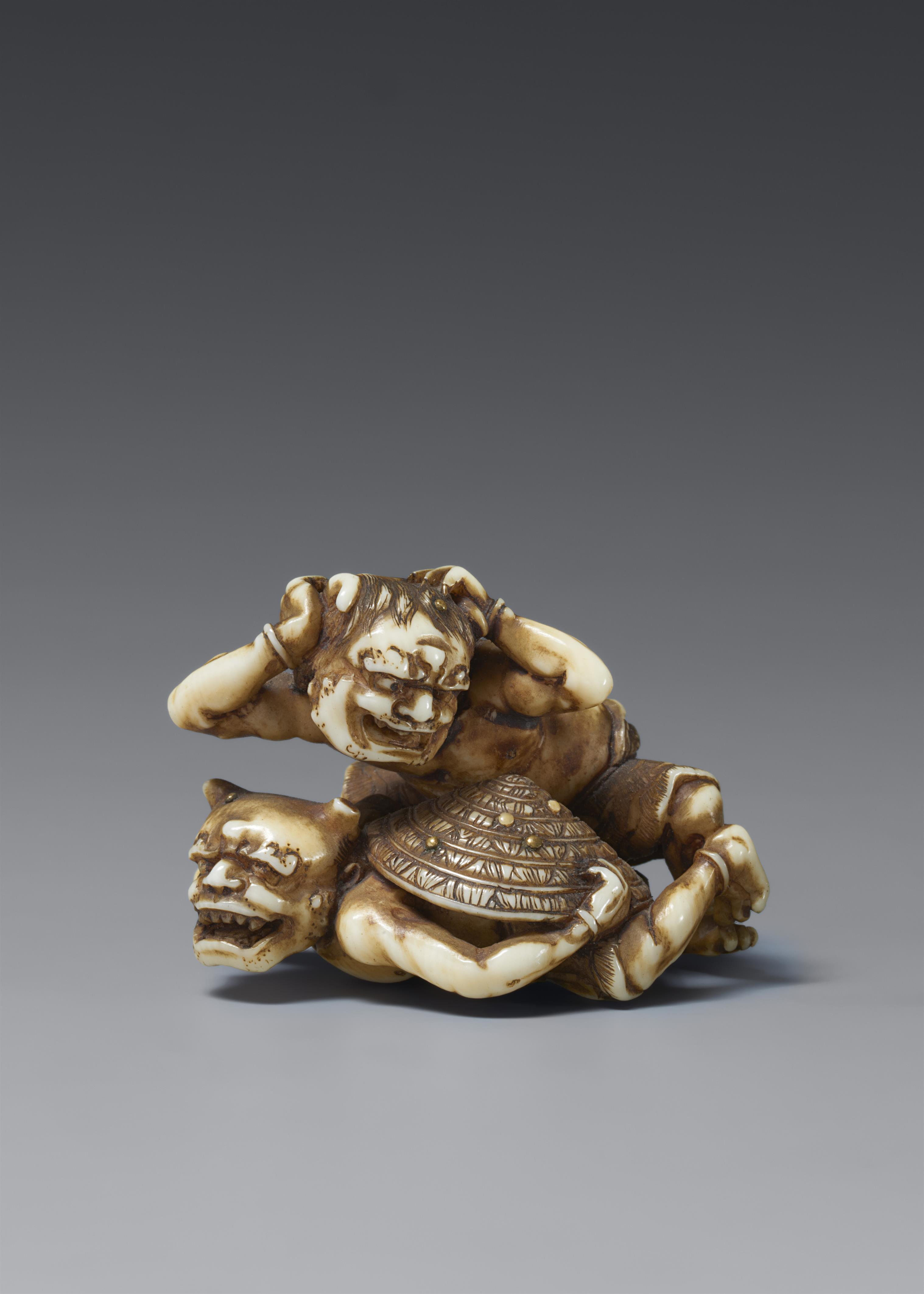 An ivory netsuke of two oni at setsubun. Mid-19th century - image-1