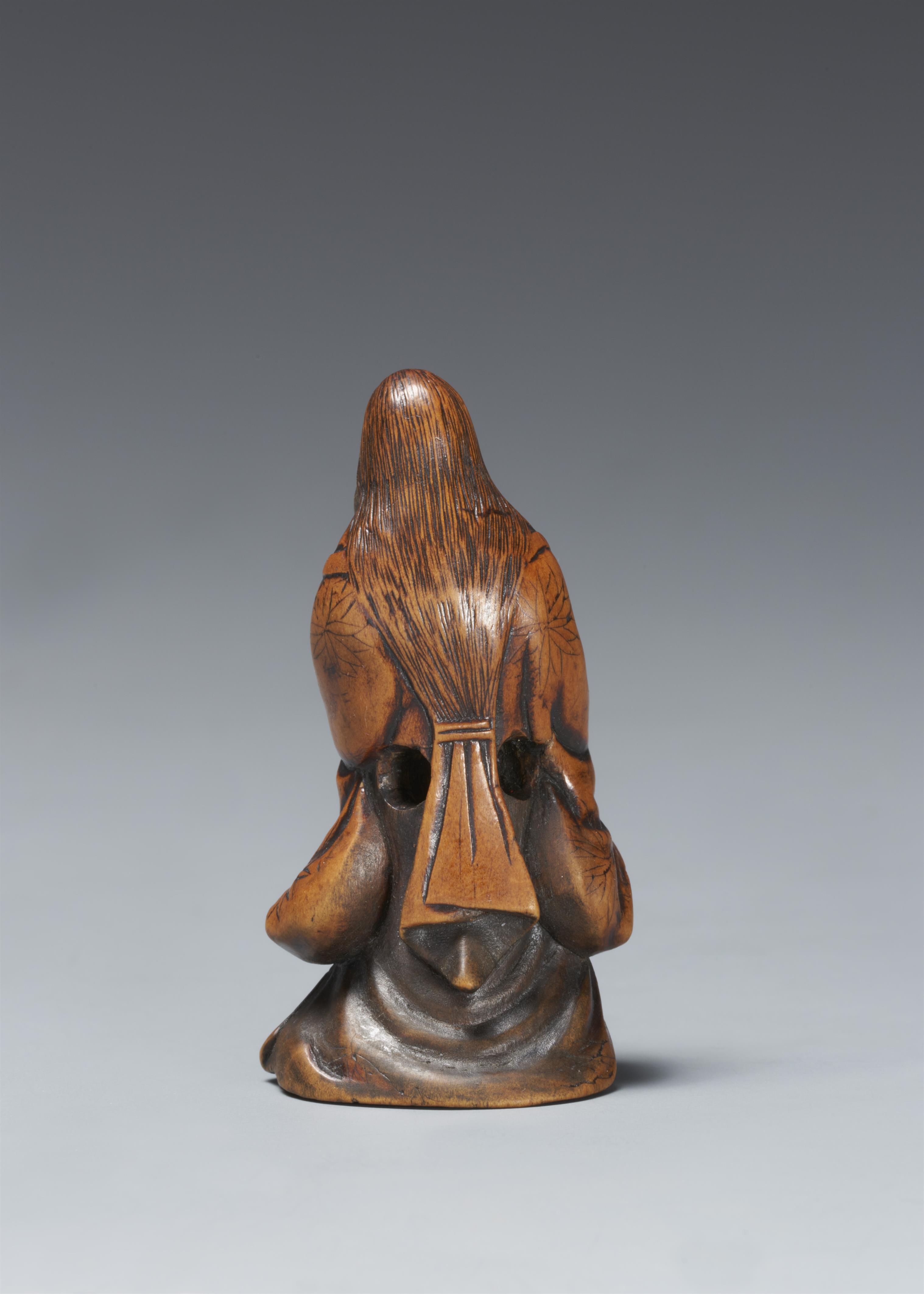 A boxwood netsuke of a jolly Okame. 19th century - image-2