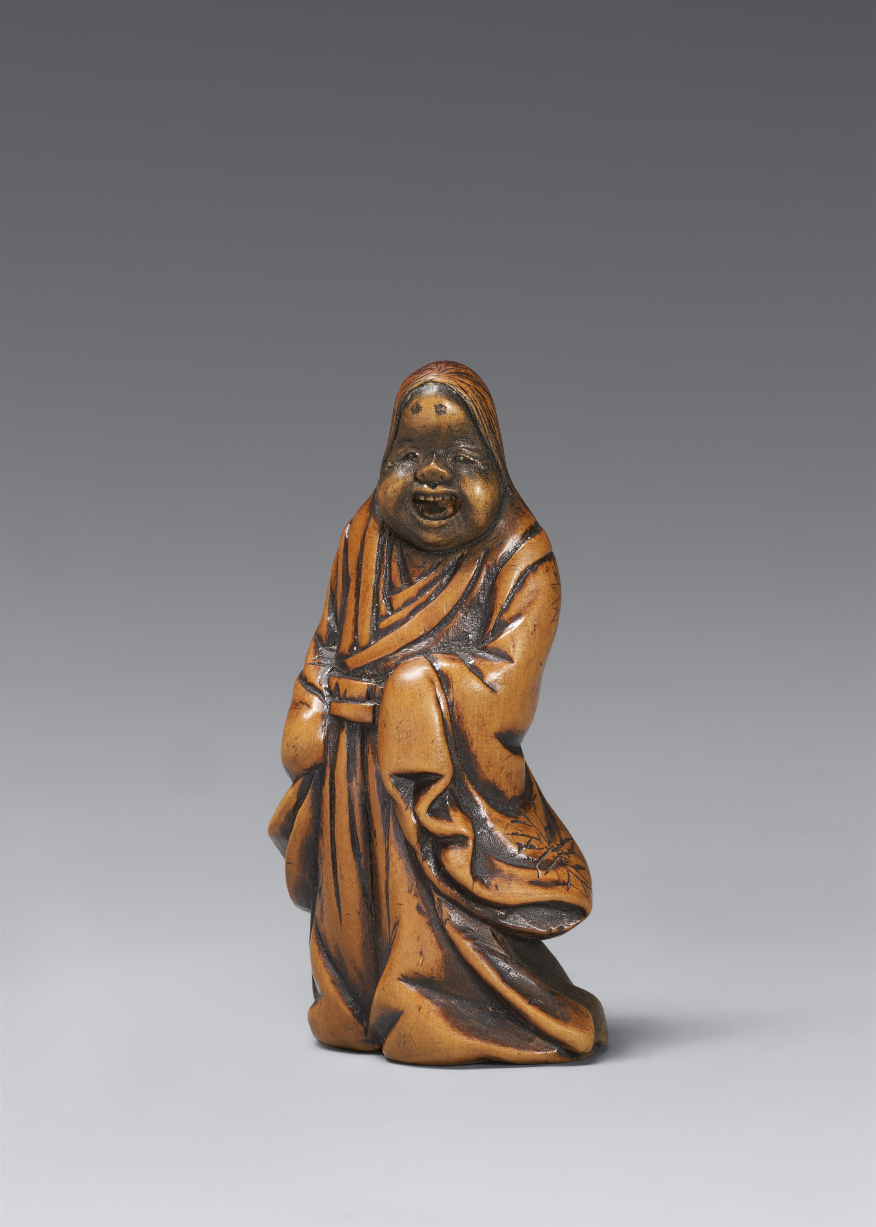 A boxwood netsuke of a jolly Okame. 19th century - image-1