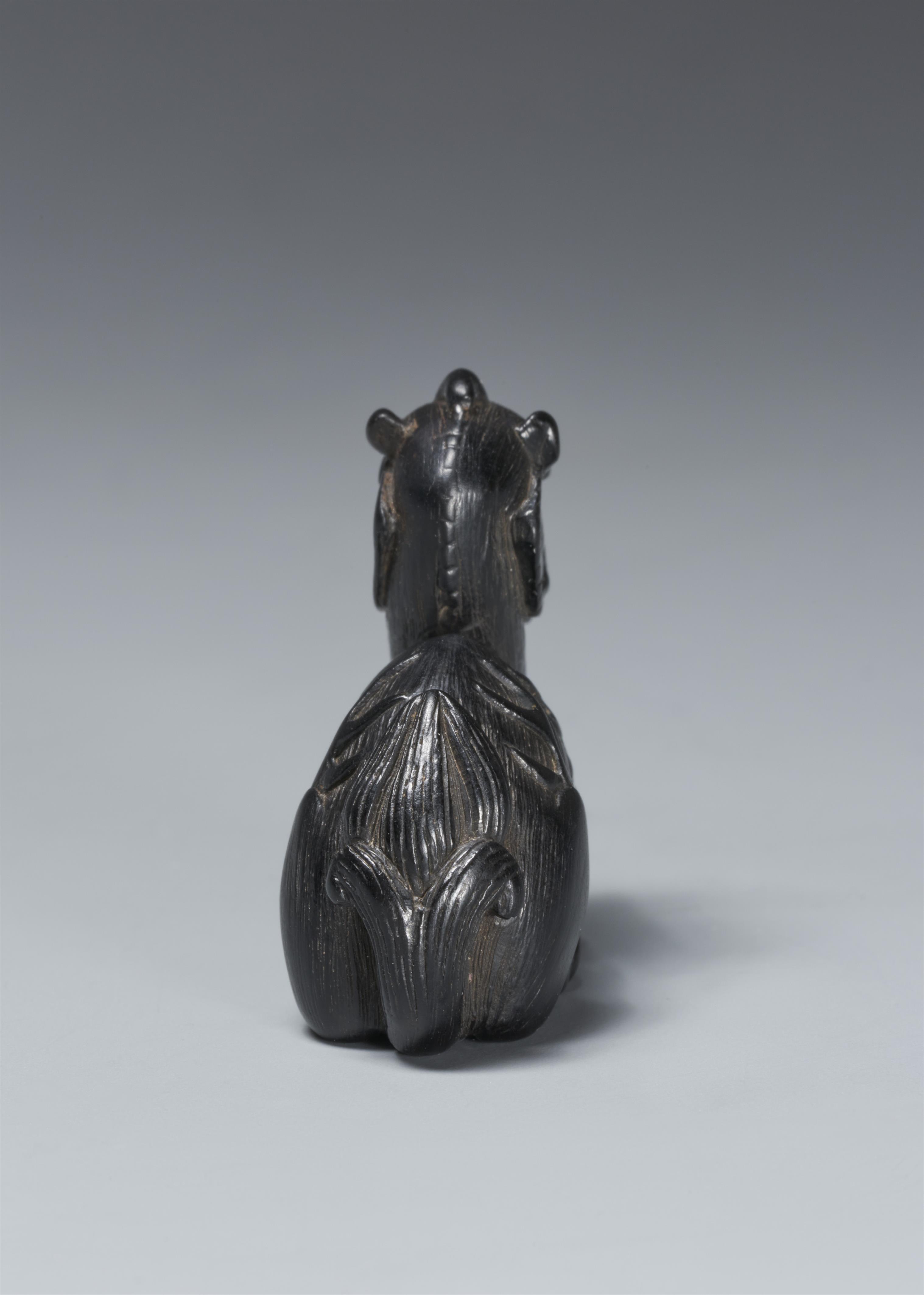 A blackwood netsuke of a seated kirin. 19th century - image-4