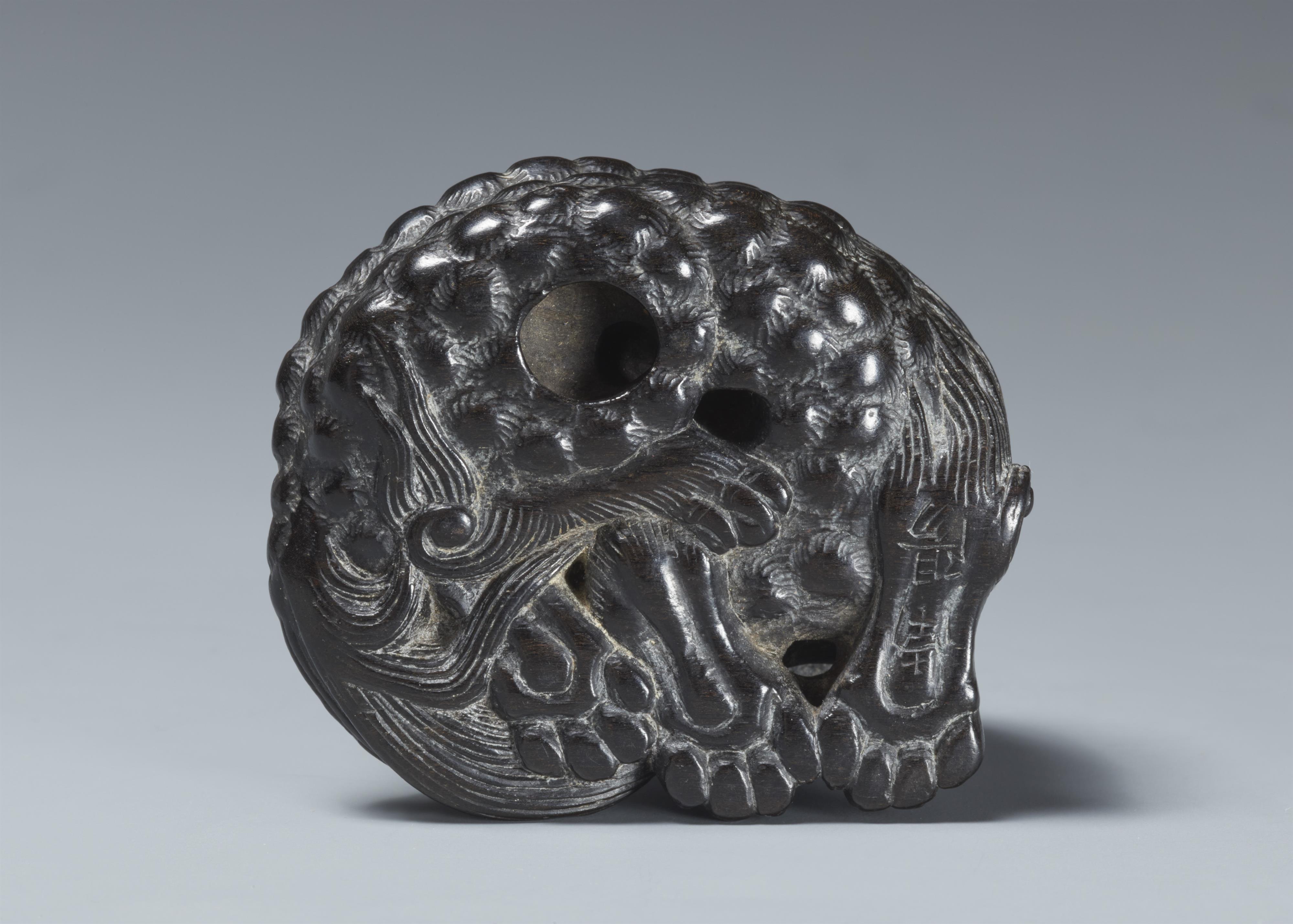 A kokutan netsuke of a reclining shishi. 19th century - image-5