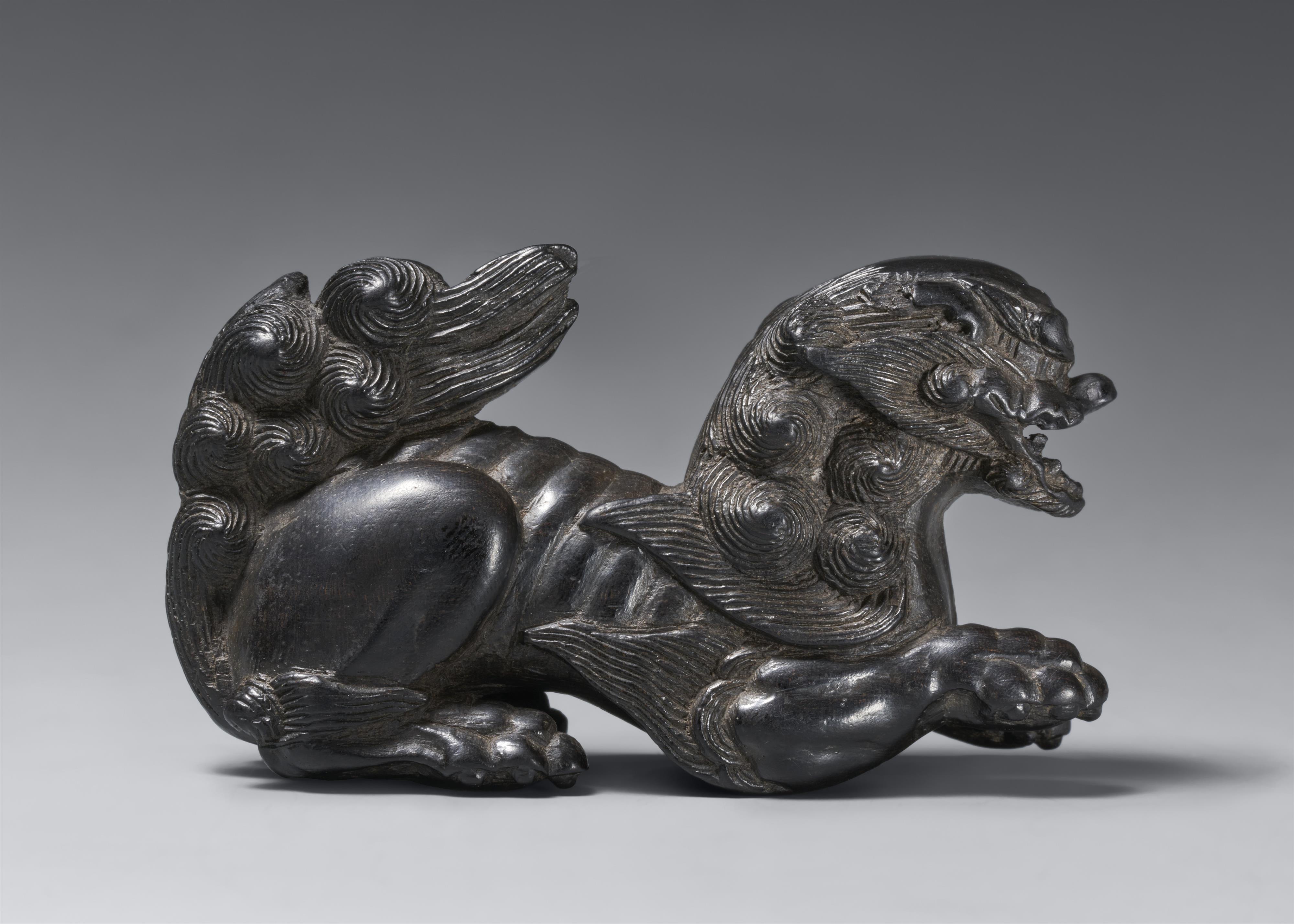 A large kokutan netsuke of a shishi. 19th century - image-2