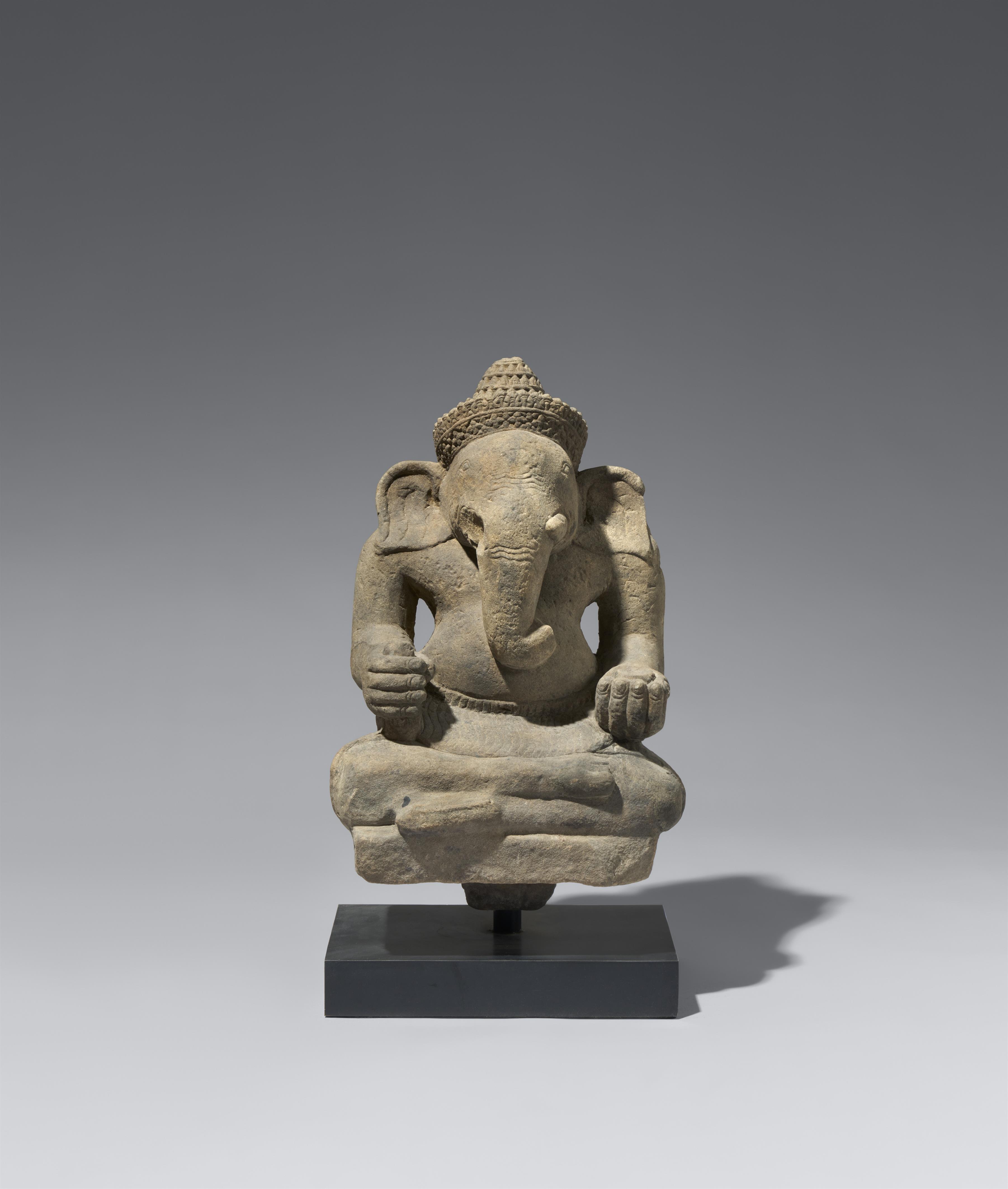 An Angkor Wat-style sandstone figure of a seated Ganesha. Cambodia. 12th century - image-1