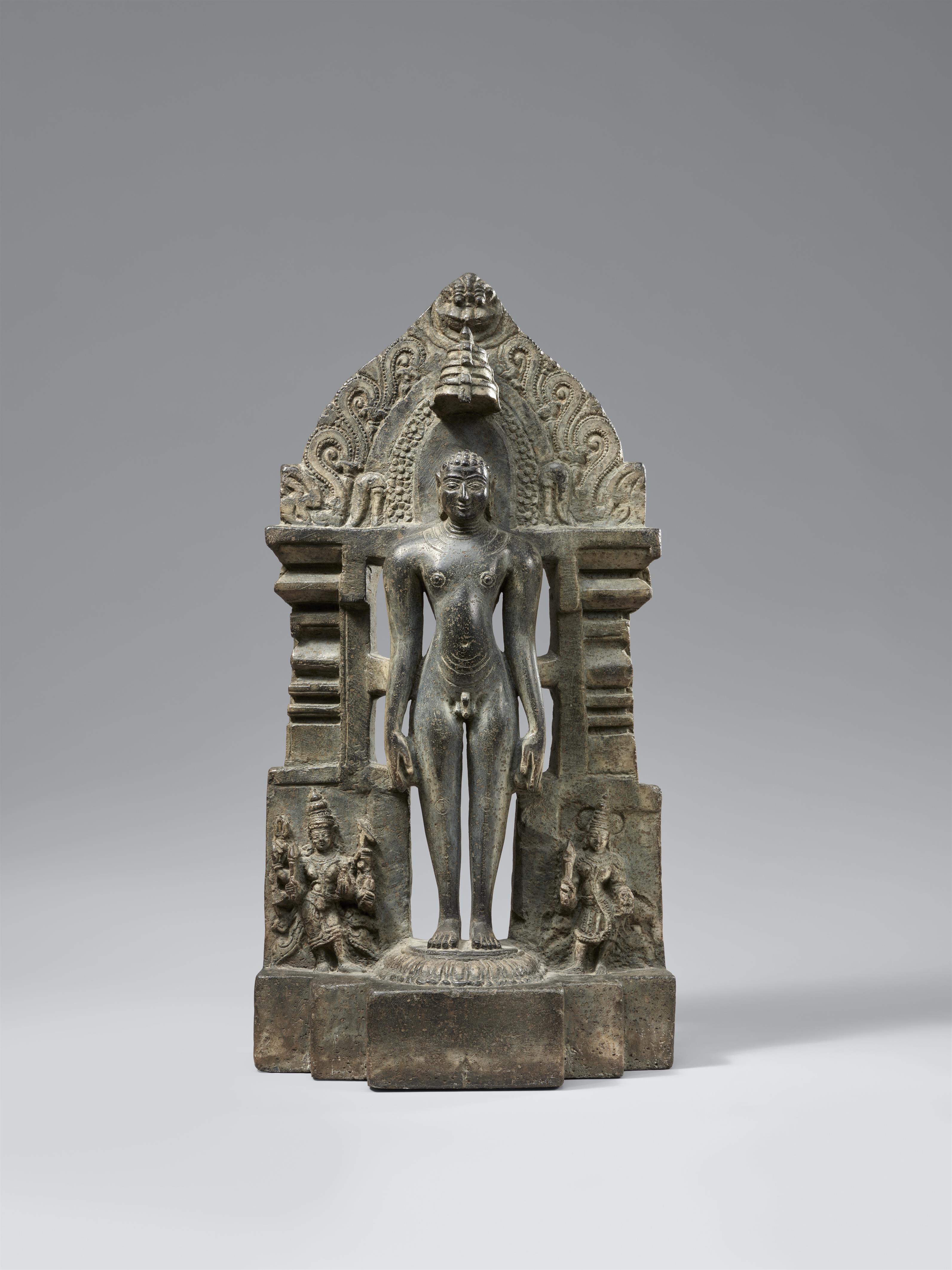 A black stone Jain stele of a tirthankara. India, Karnataka. 12th/14th century - image-1