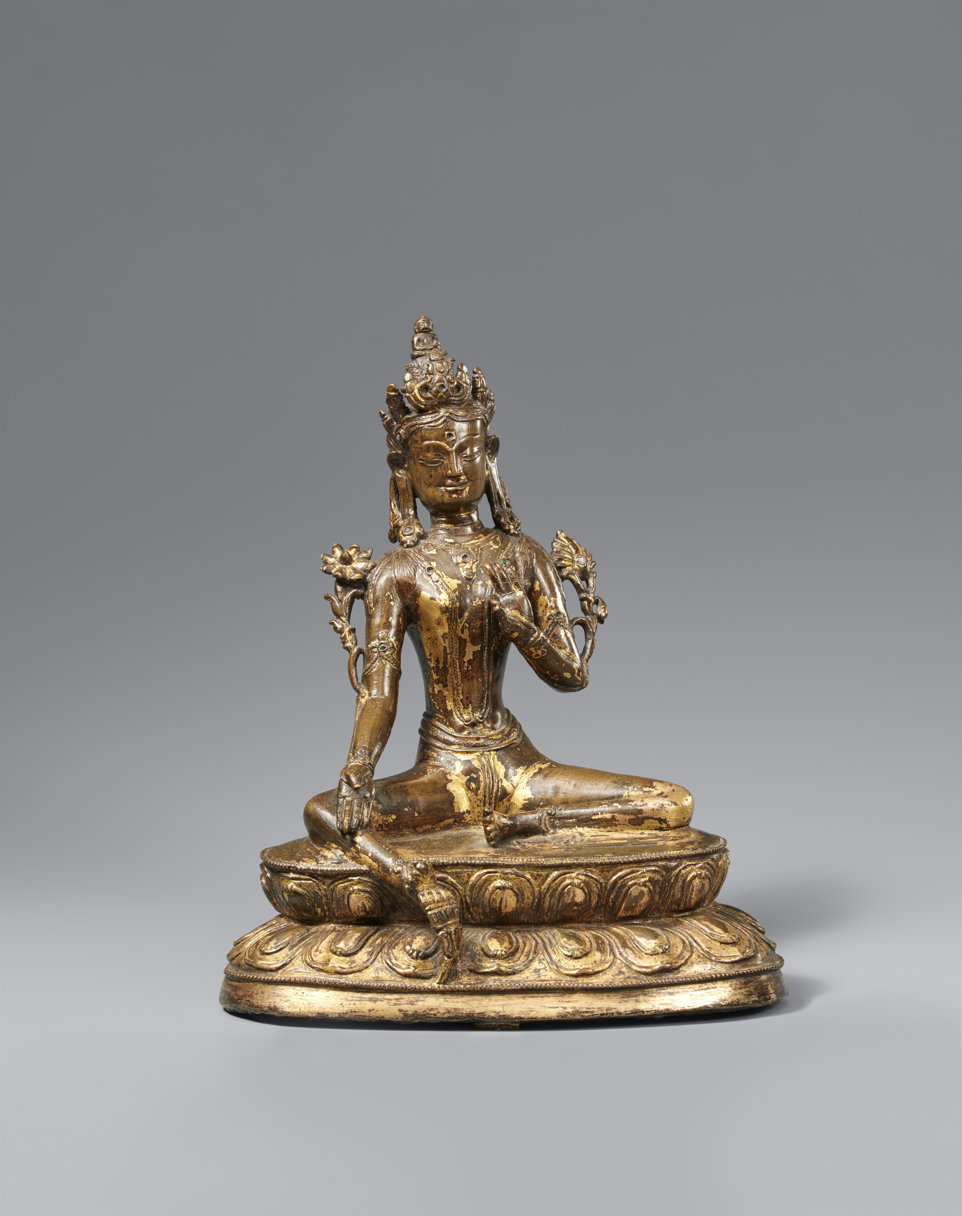 A bronze figure of Shyamatara (Green Tara). Tibet, 14th century or later - image-1