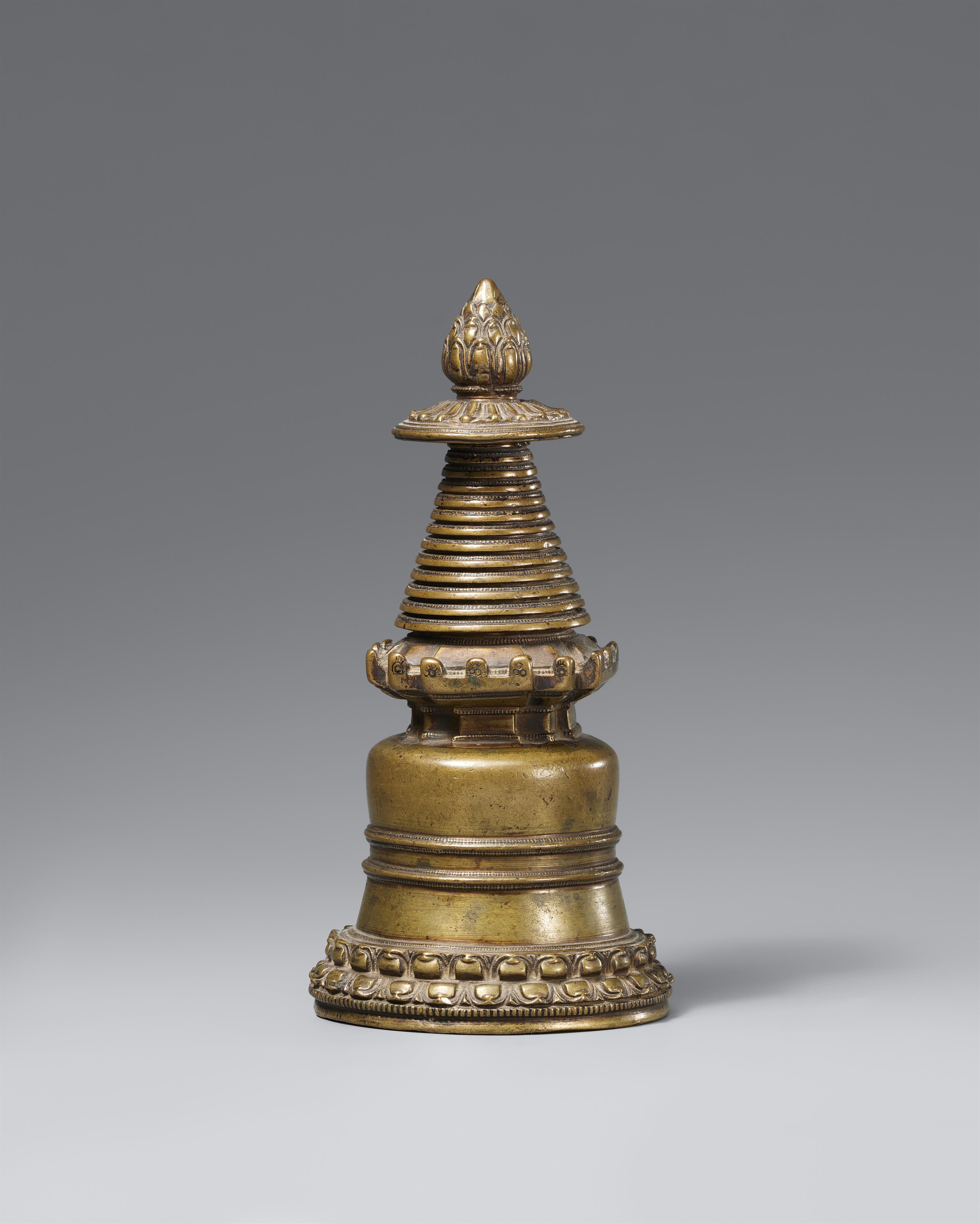 A copper alloy stupa reliquary (mChod-rten). Tibet, 13th/14 century - image-1