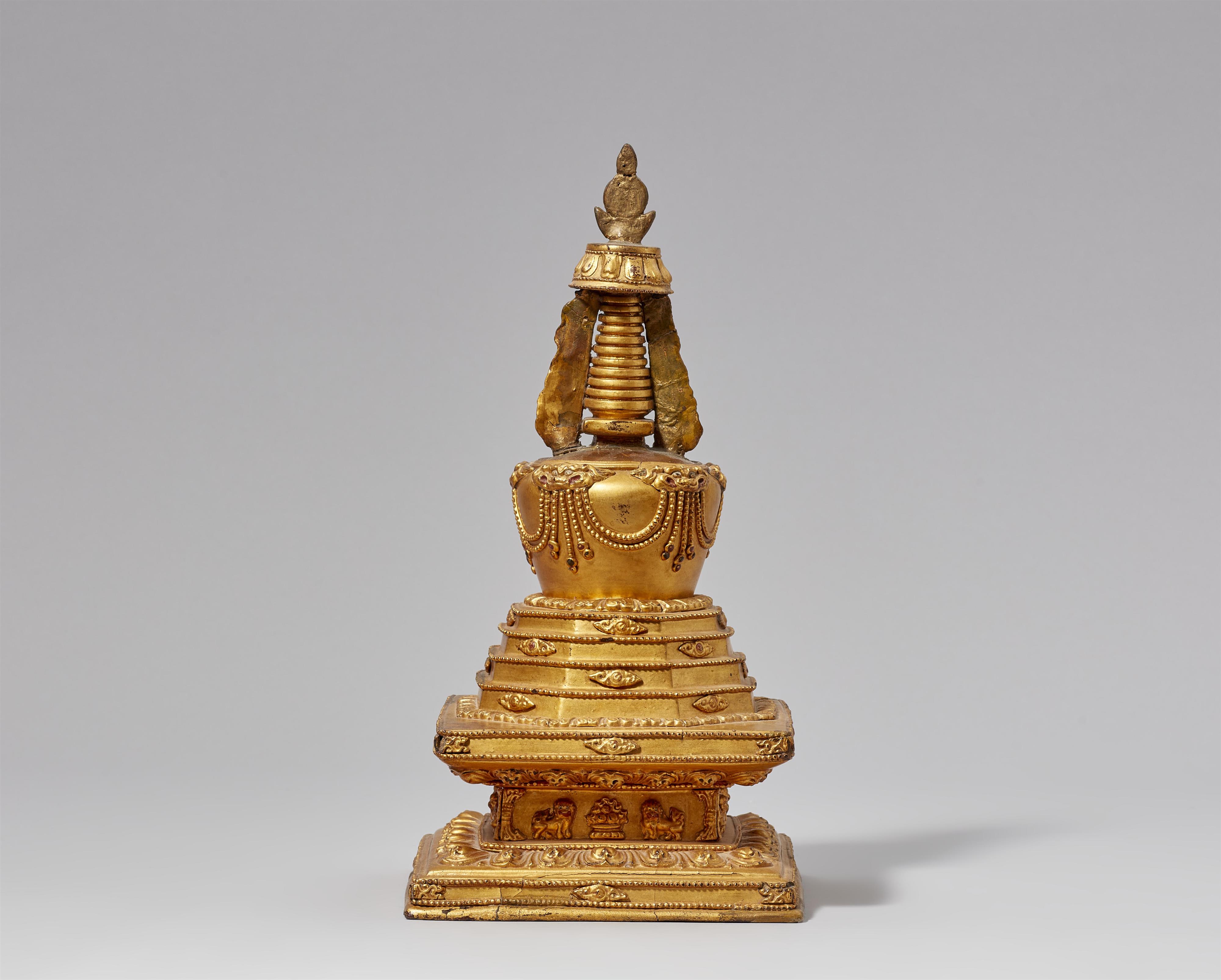 A gilt and polychromed wood stupa (mChod-rten) on a lion throne. Tibet, 19th century - image-3
