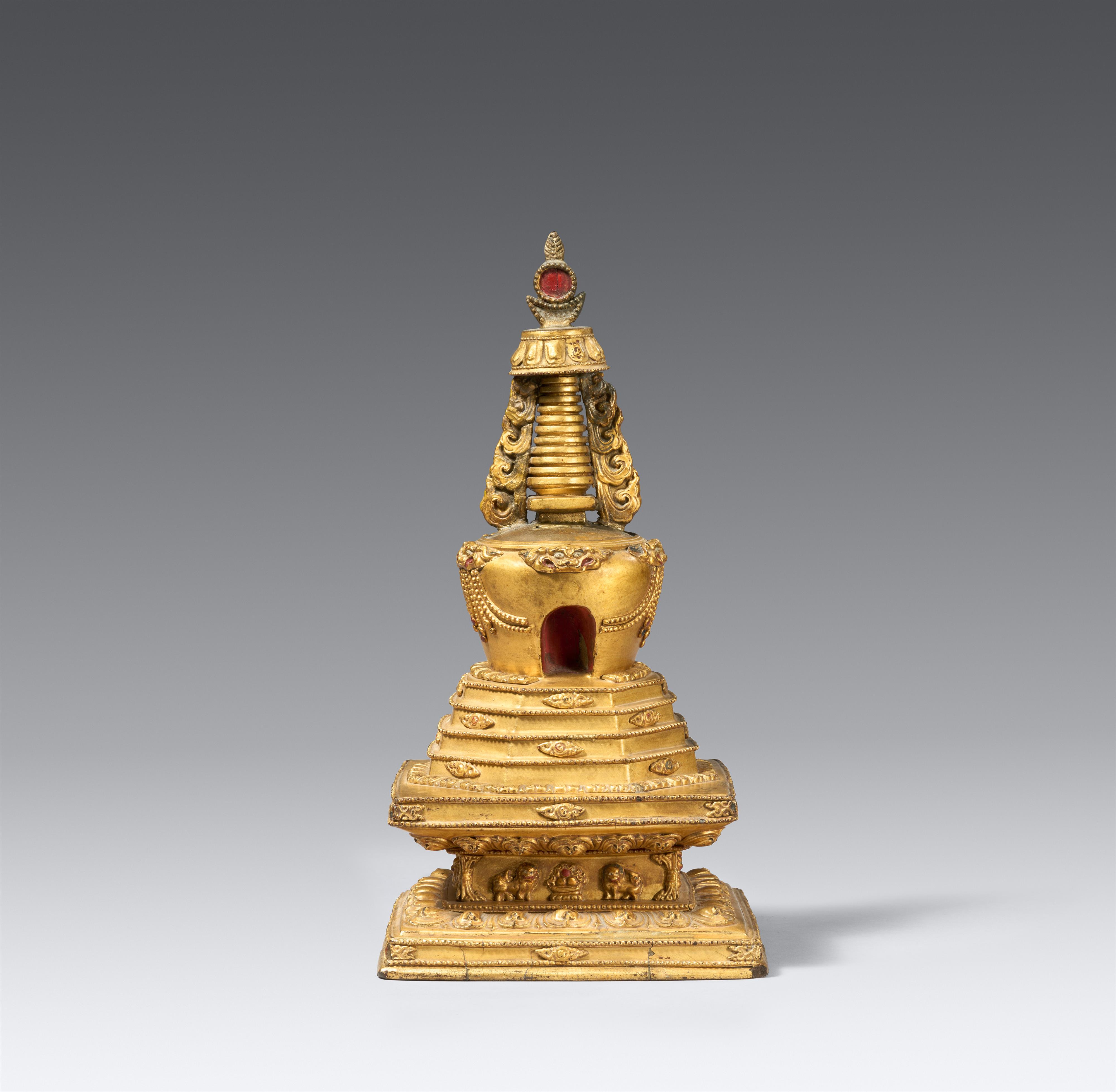 A gilt and polychromed wood stupa (mChod-rten) on a lion throne. Tibet, 19th century - image-1