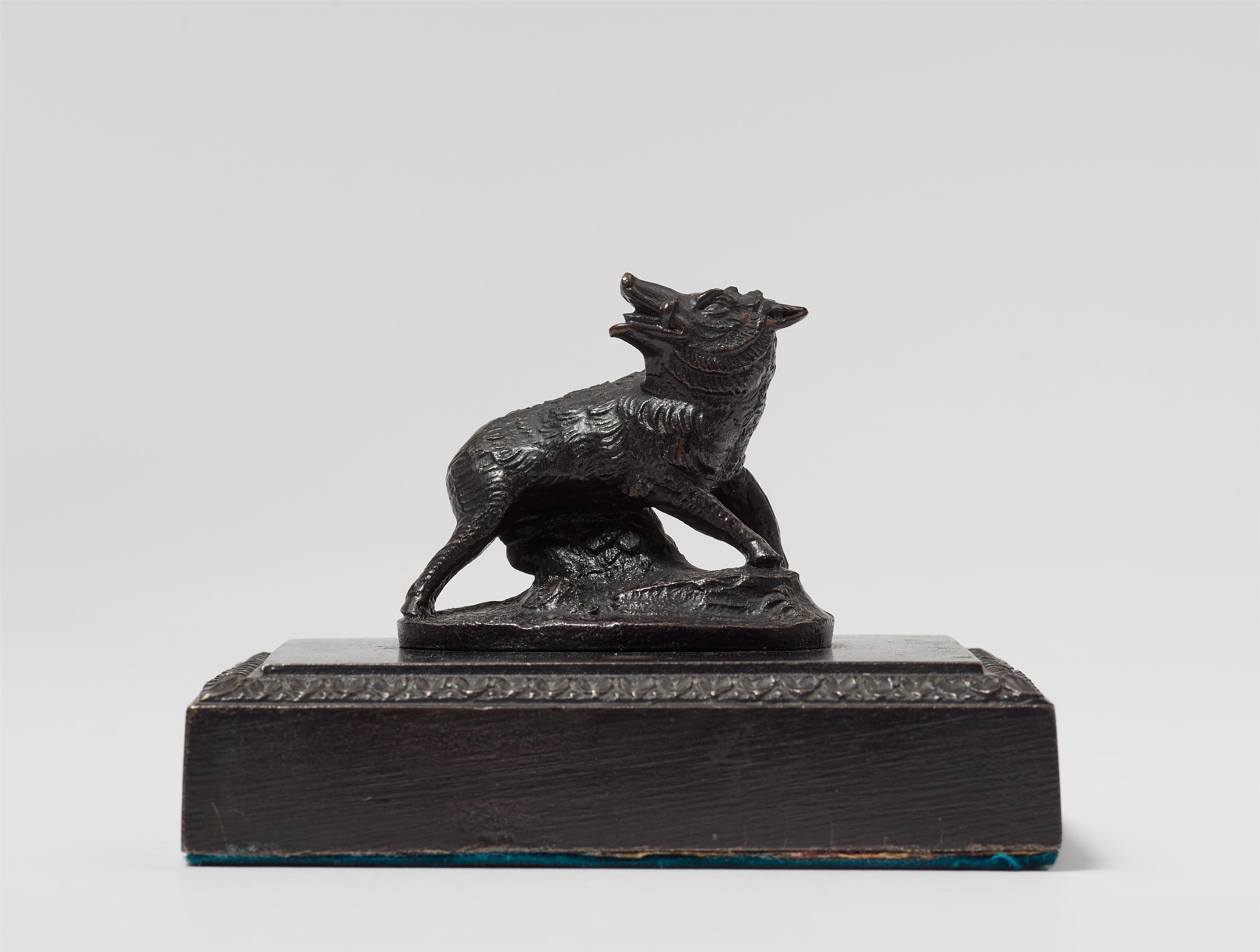 A cast iron boar paperweight - image-1