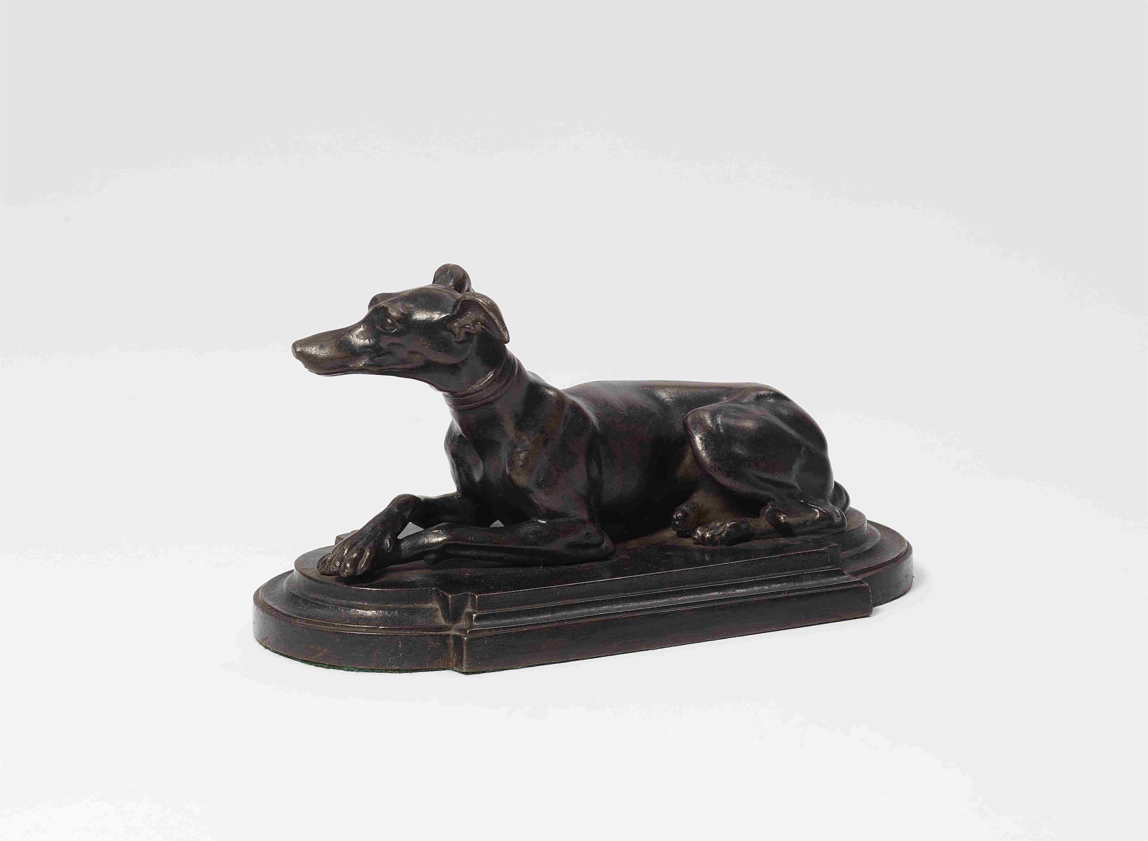 A cast iron greyhound paperweight - image-1