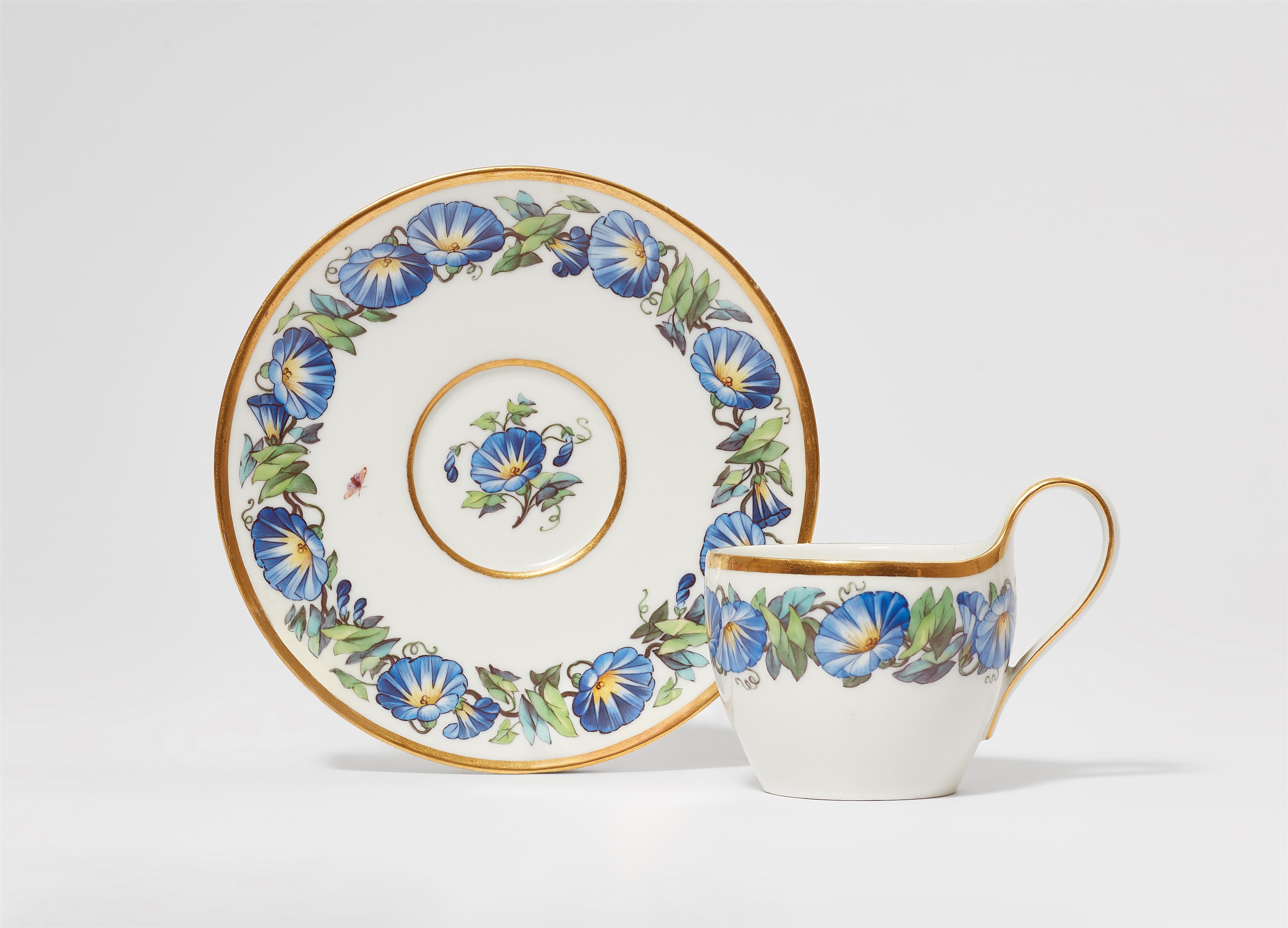 A Berlin KPM porcelain cup and saucer with morning glories - image-1