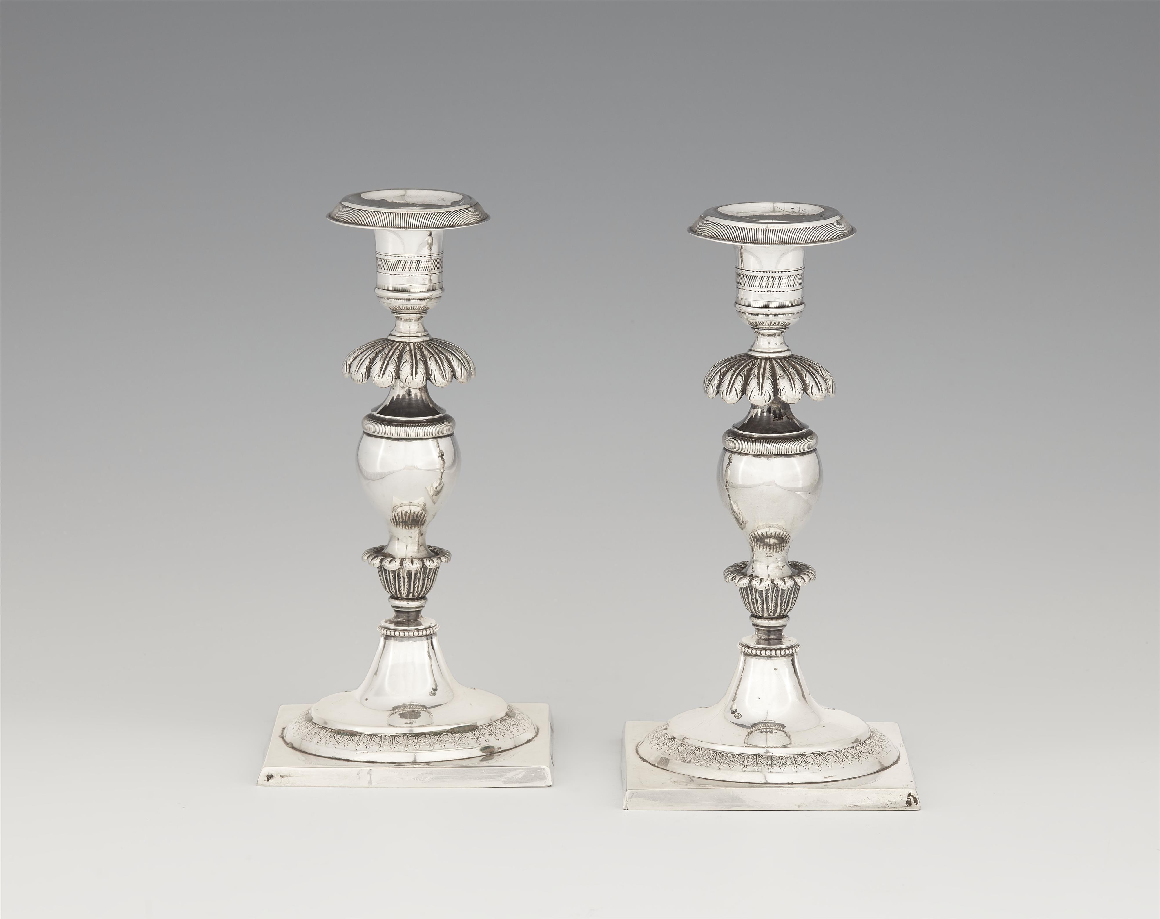 A pair of small Berlin silver candlesticks - image-1