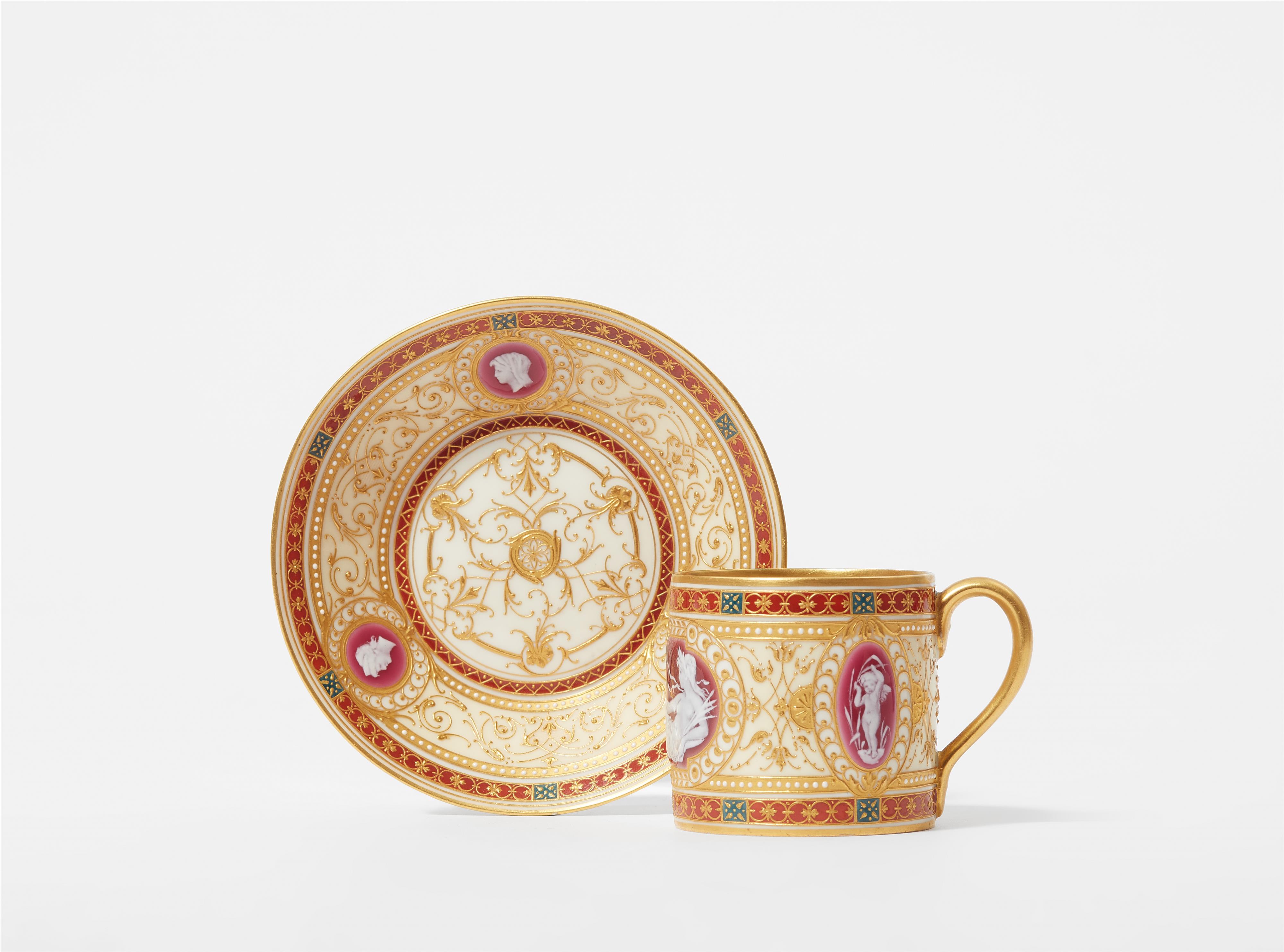 A small Berlin KPM porcelain cup and saucer with enamel decor - image-1