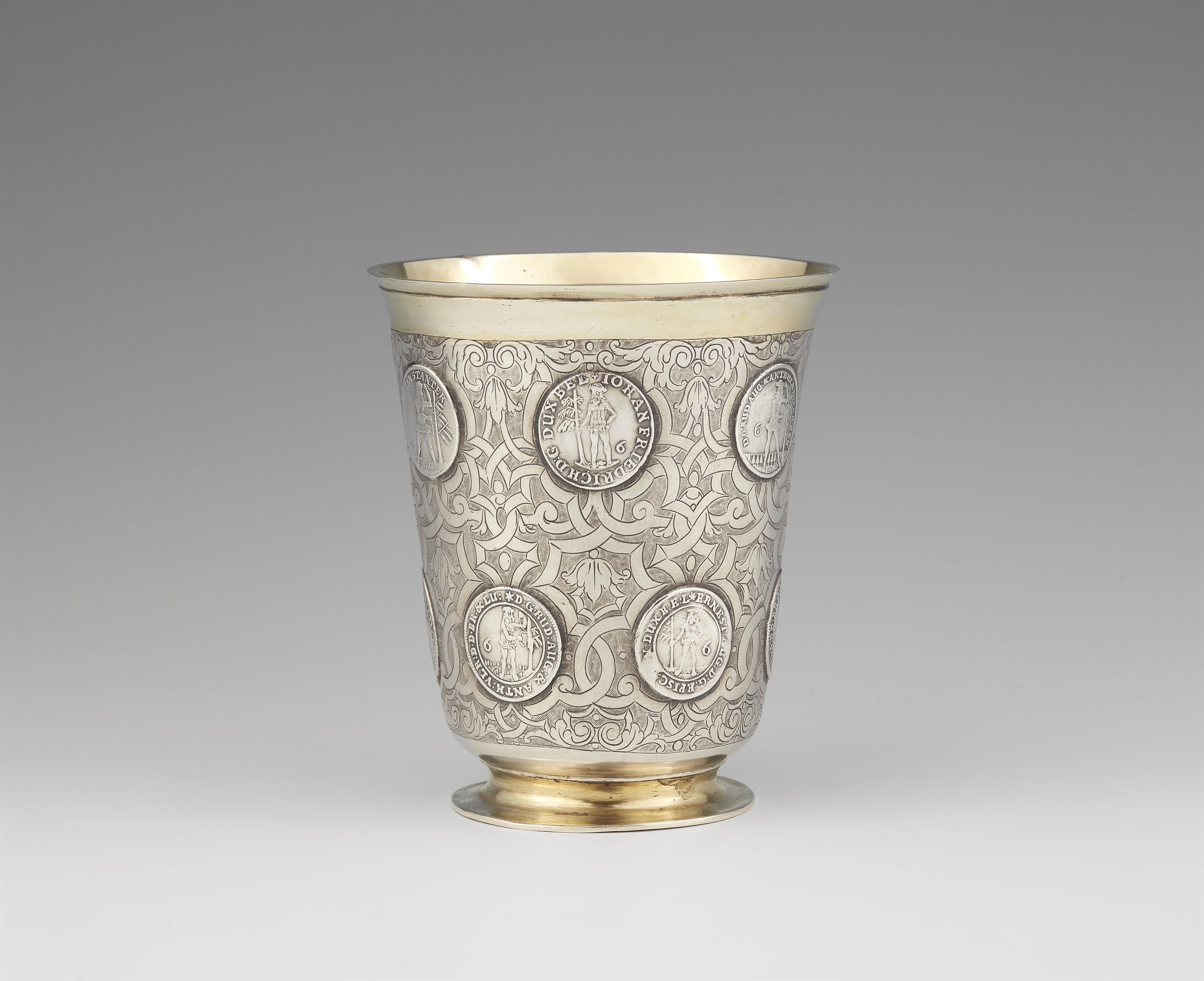 A parcel gilt Prussian silver coin-set beaker - image-1