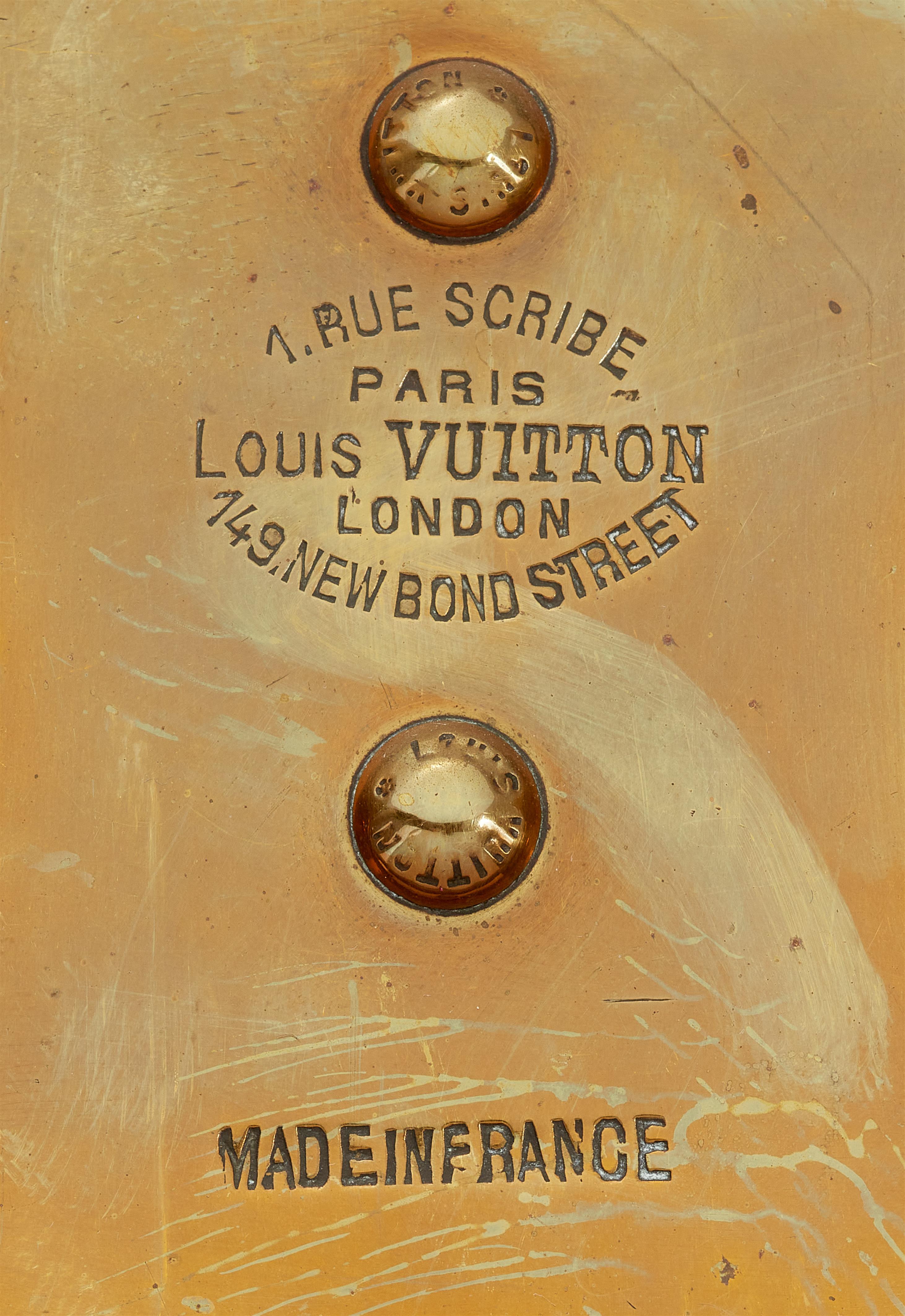A Louis Vuitton suitcase - image-4