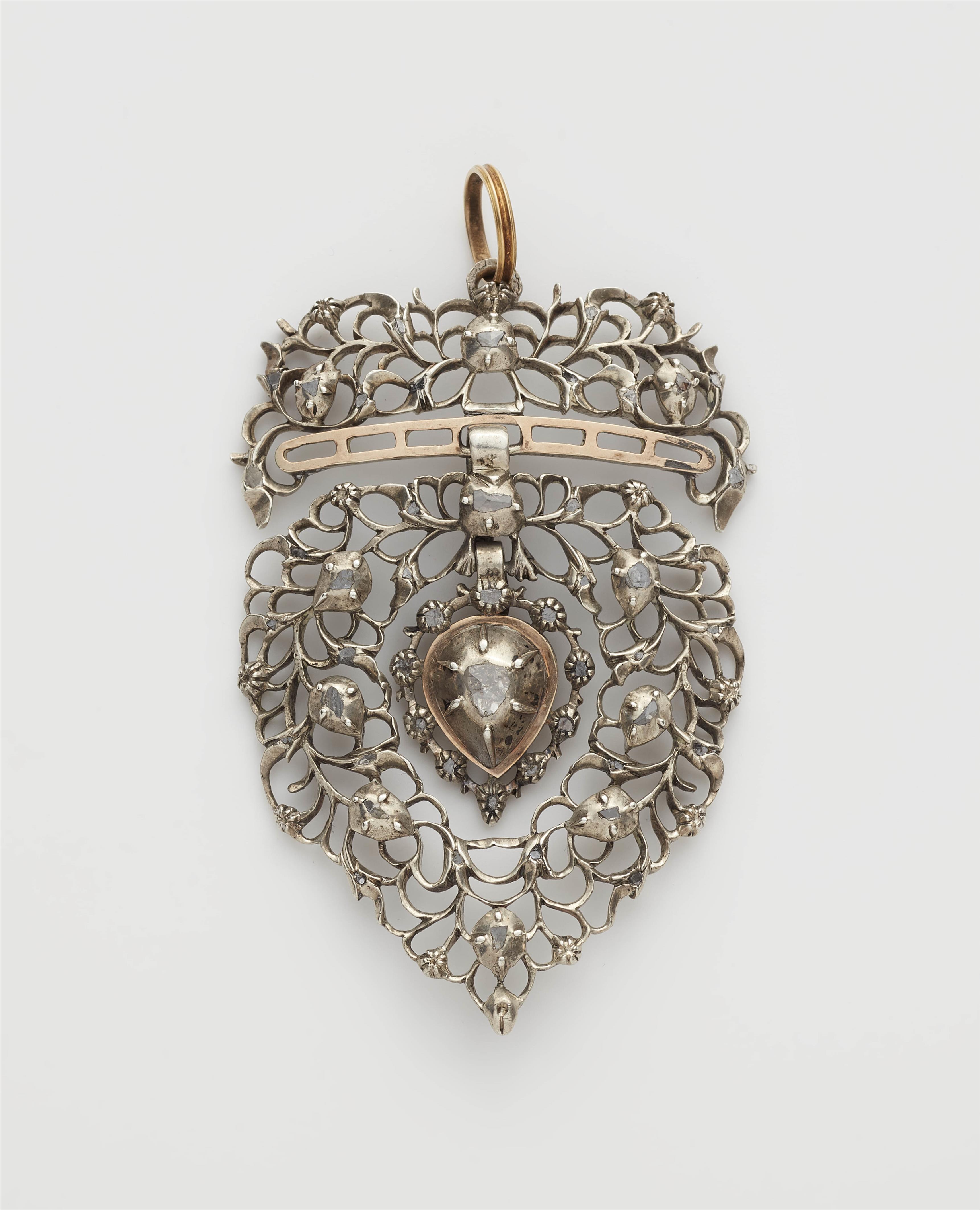 A Belgian silver gilt diamond pendant shaped as a crowned heart. - image-1