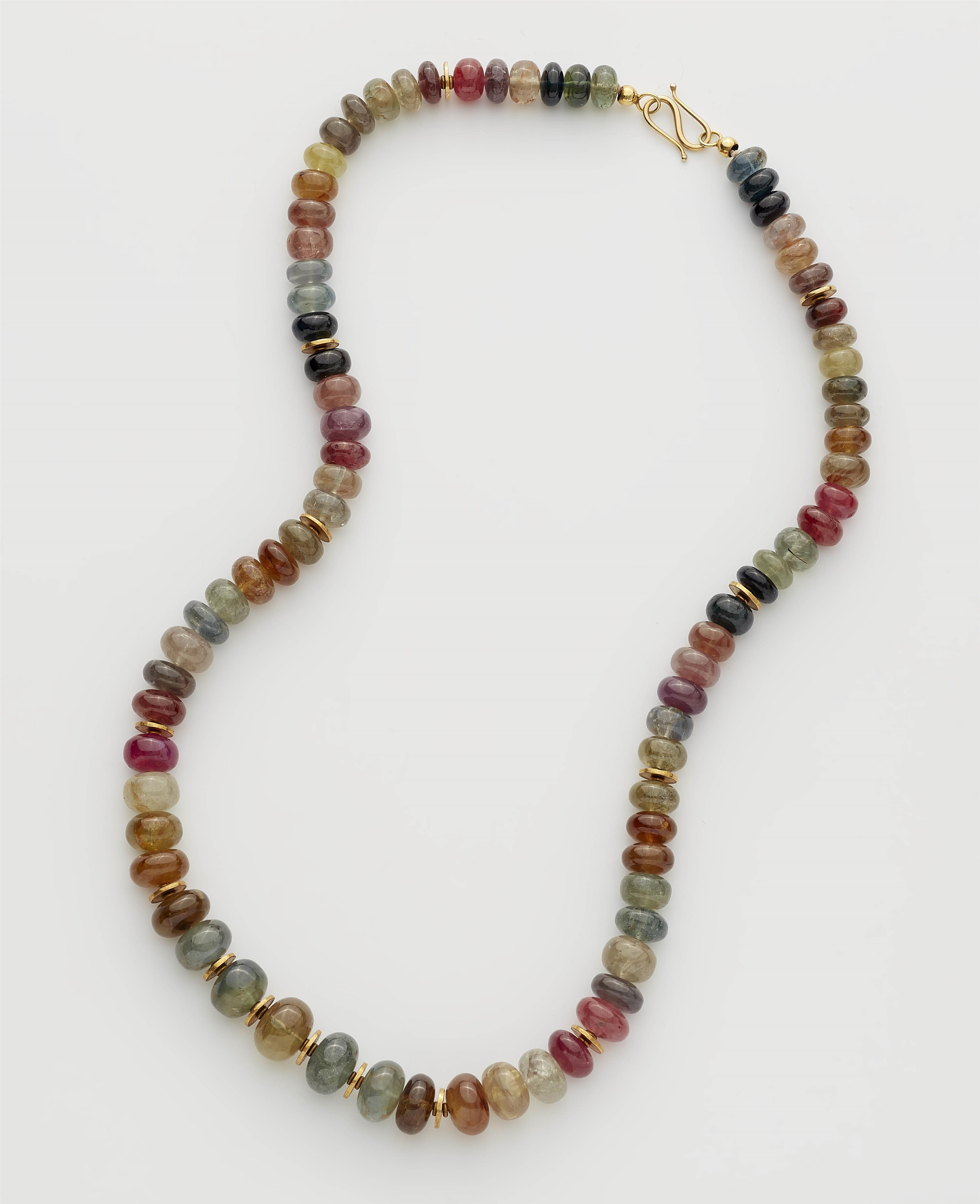 A German 18k gold and coloured sapphire necklace. - image-1